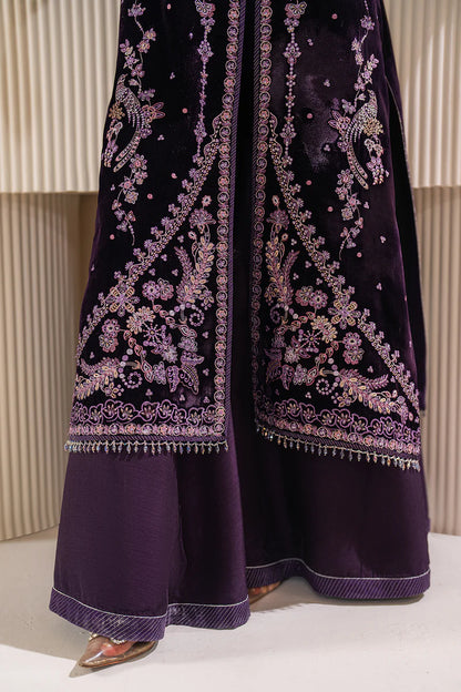 Luxury designer velvet gown with intricate embroidery