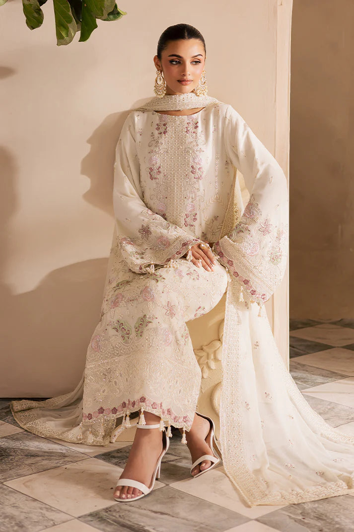 Off-white embroidered chiffon suit with organza detailing and raw silk trouser – ideal for weddings and Eid wear for Pakistani women in USA and UK.

