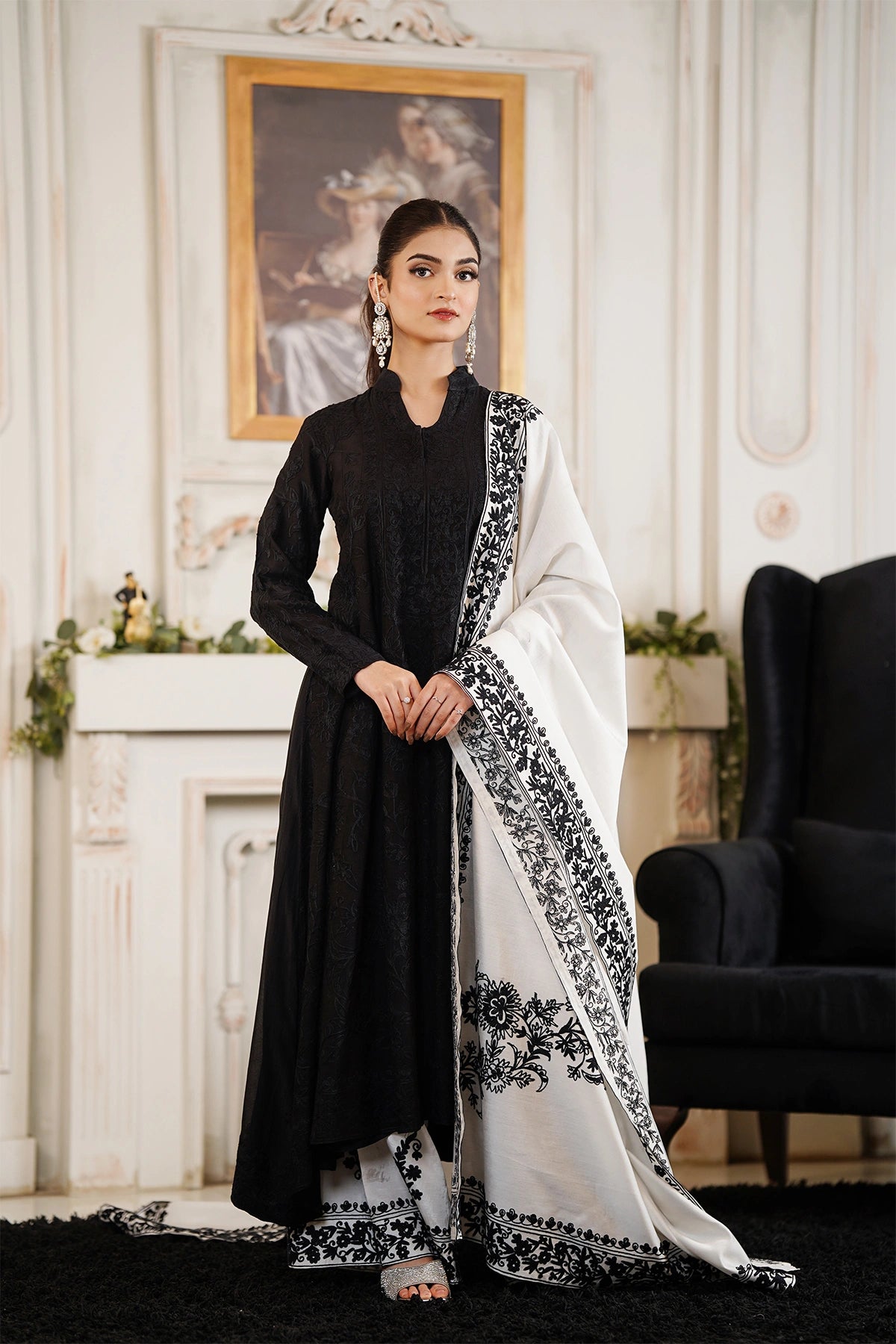 Elara black khaadi net embroidered frock with Korean silk palazzo pants and embroidered silk dupatta by MariamRaj
