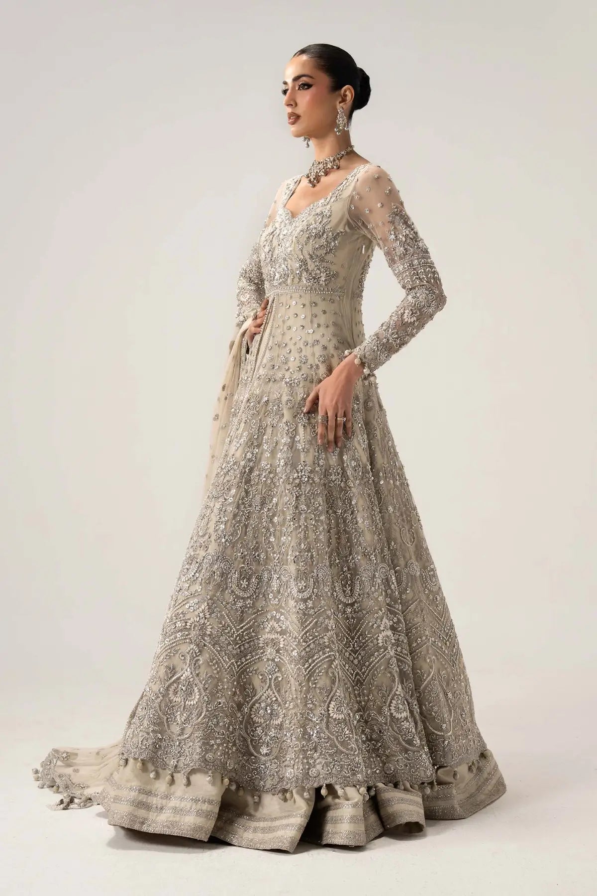 Elaria ivory embellished bridal gown by Maria B with net dupatta, pearl detailing and raw silk frock