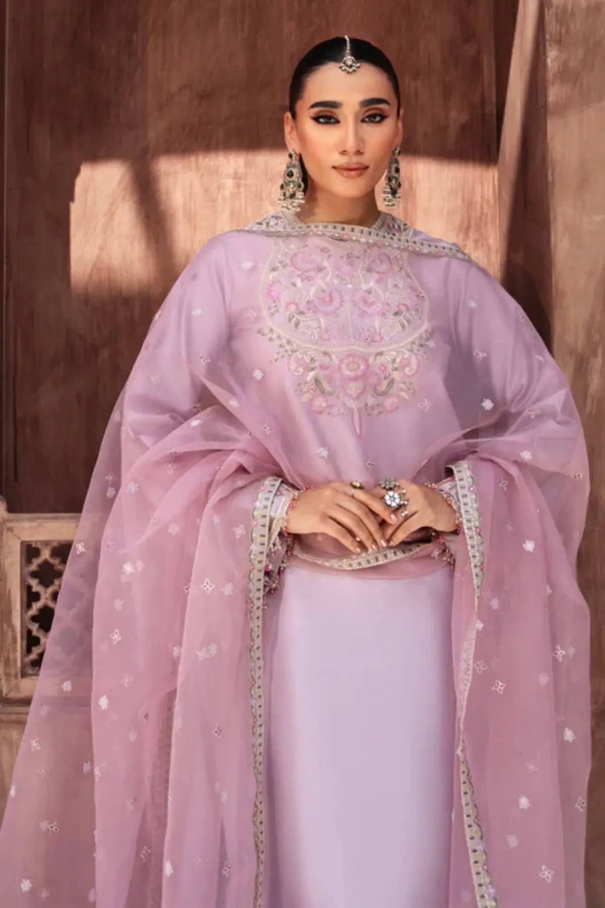 Lavender pink embroidered tussar silk kurta set by Eleya with organza dupatta for festive occasions