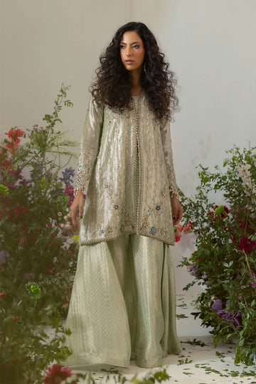 Silver gold embellished lamé jacket with flared pants featuring zardozi and tassel details for formal wear