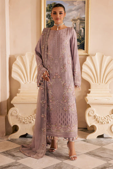 Soft lilac Pakistani chiffon suit with embroidered dupatta, organza borders, and raw silk trouser – ideal for Eid and formal wear in USA, UK, and Canada.

