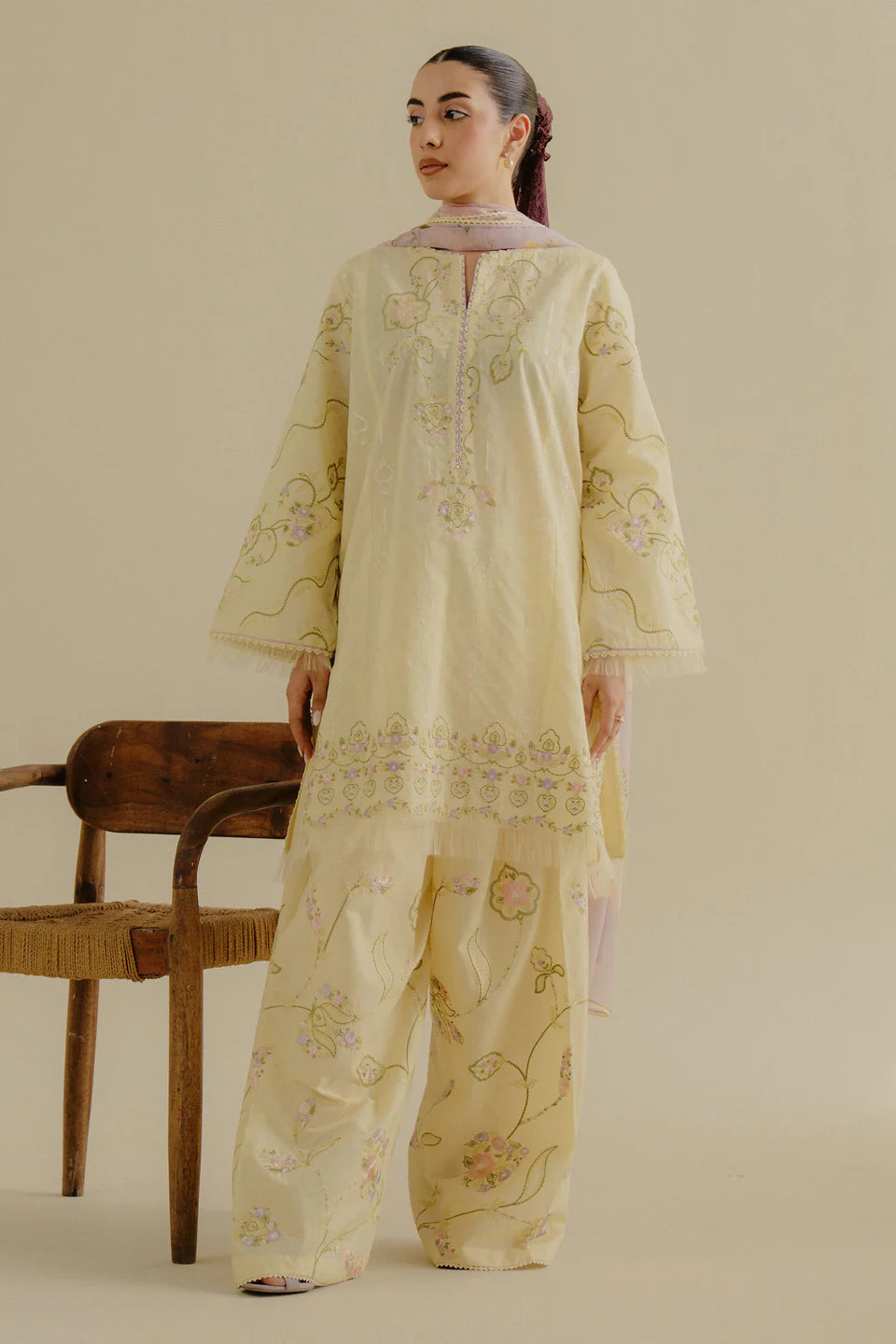 Elva-1A- A soft buttercup yellow embroidered suit By- Zara Shahjahan