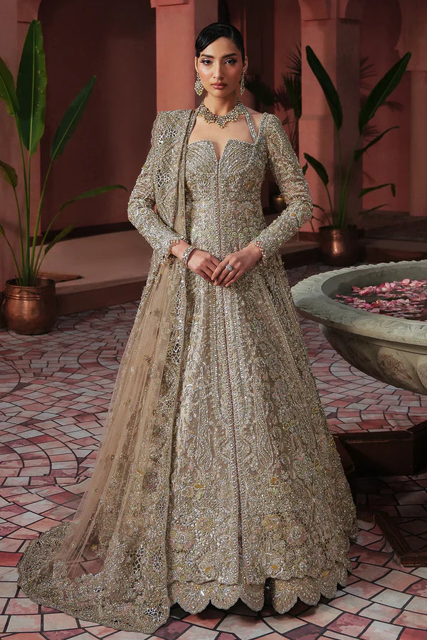 Soft peach pink Pakistani wedding outfit in luxe tissue fabric with aqua accents, hand-embellished with cutwork, dabka, and fine detailing; paired with a sheer net dupatta. Perfect for Pakistani brides in the UK.