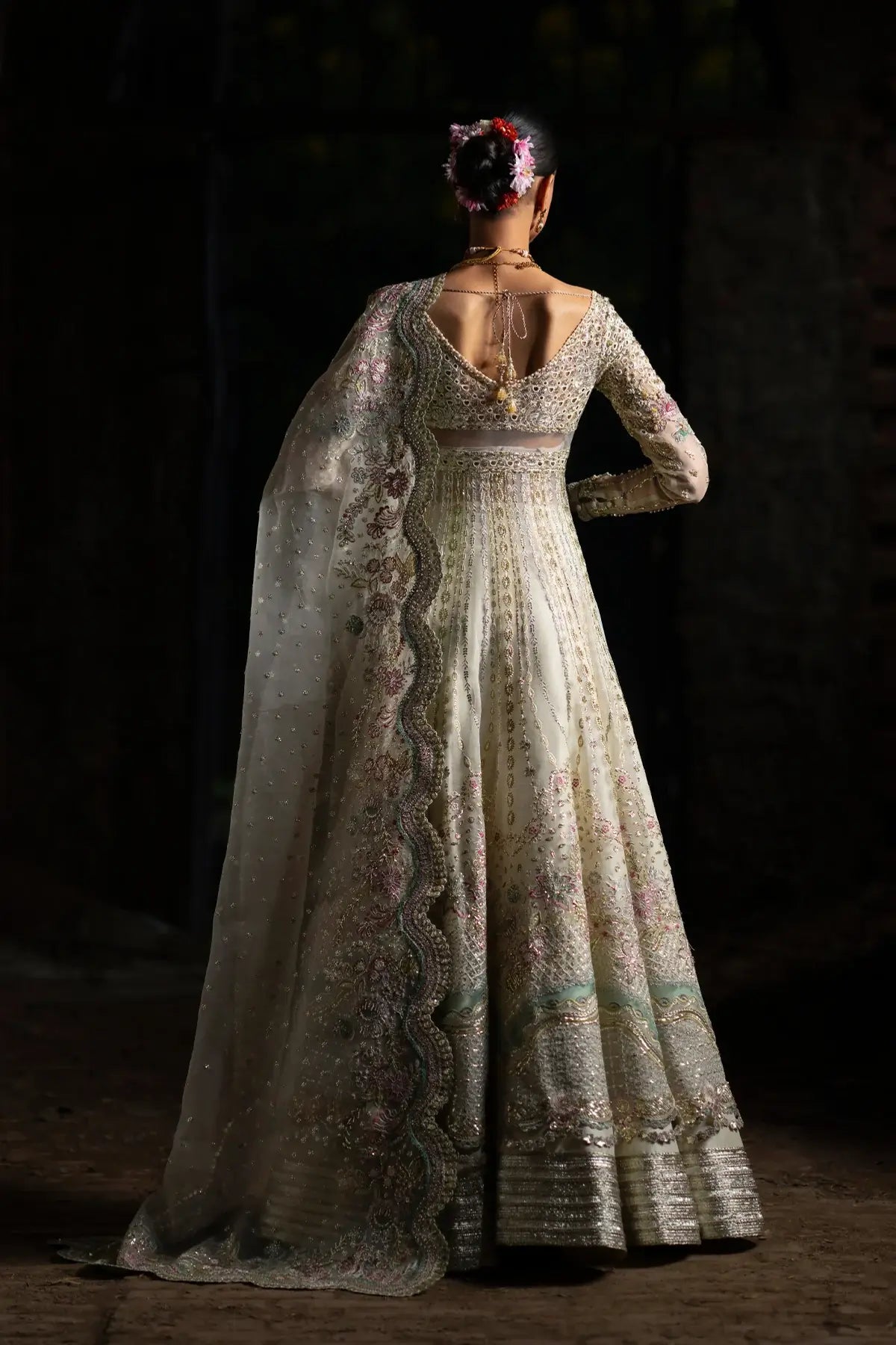 Ivory organza lehenga outfit by Nyra for wedding and Eid elegance.