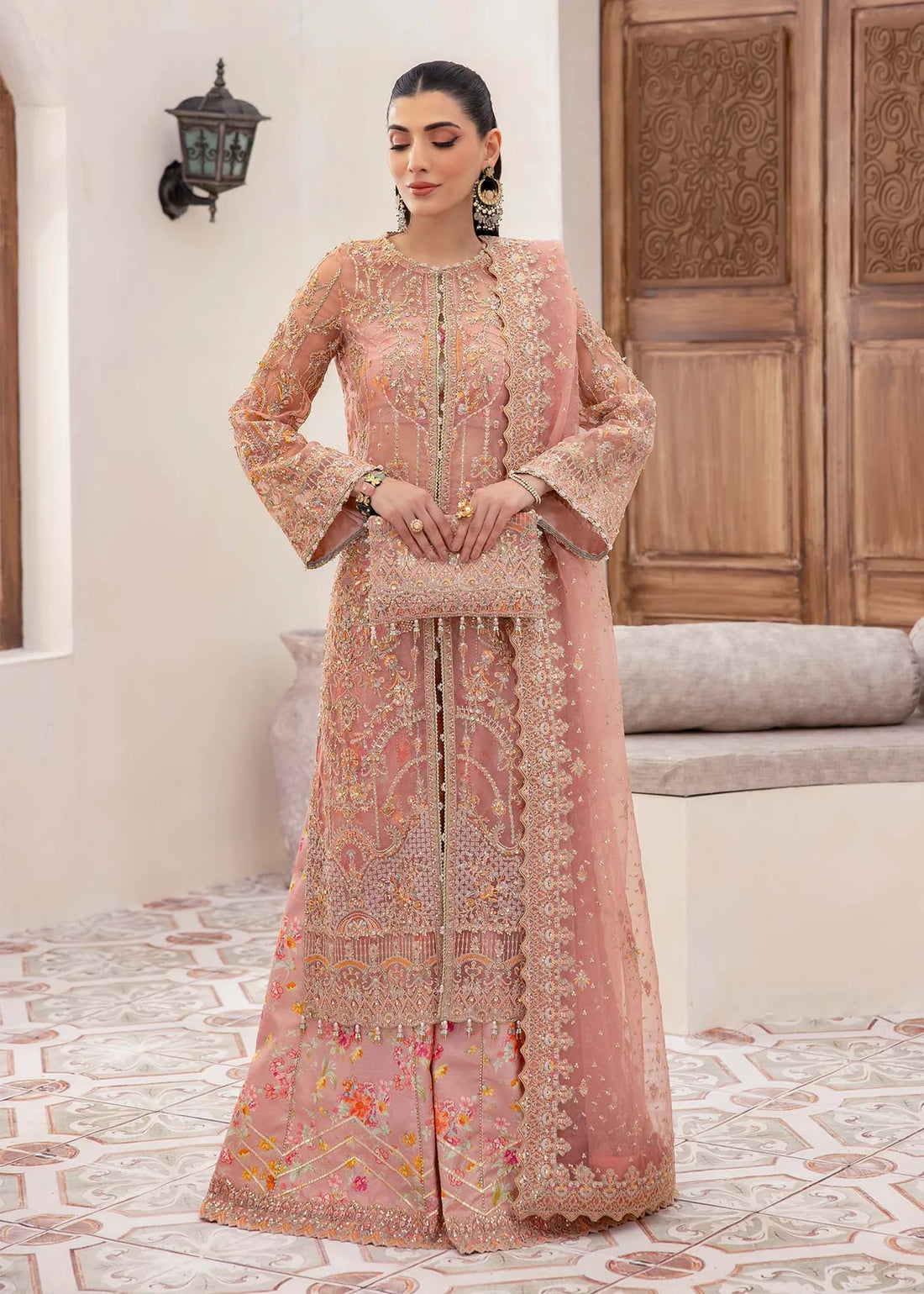 Peach organza Pakistani gown with sequin dupatta and printed flared trousers – ideal for formal wear and festive occasions in USA, UK, and Canada.