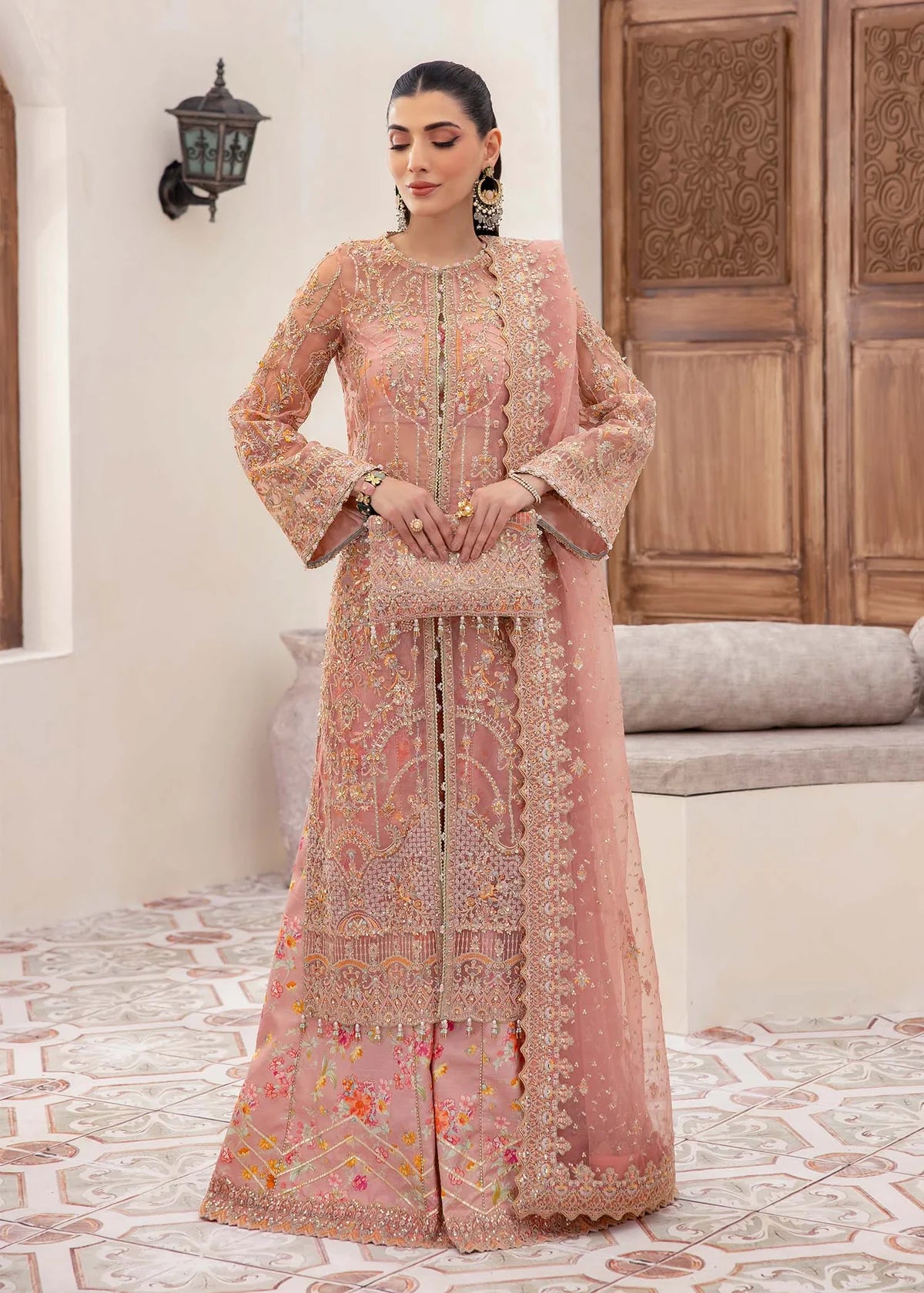 Peach organza Pakistani gown with sequin dupatta and printed flared trousers – ideal for formal wear and festive occasions in USA, UK, and Canada.
