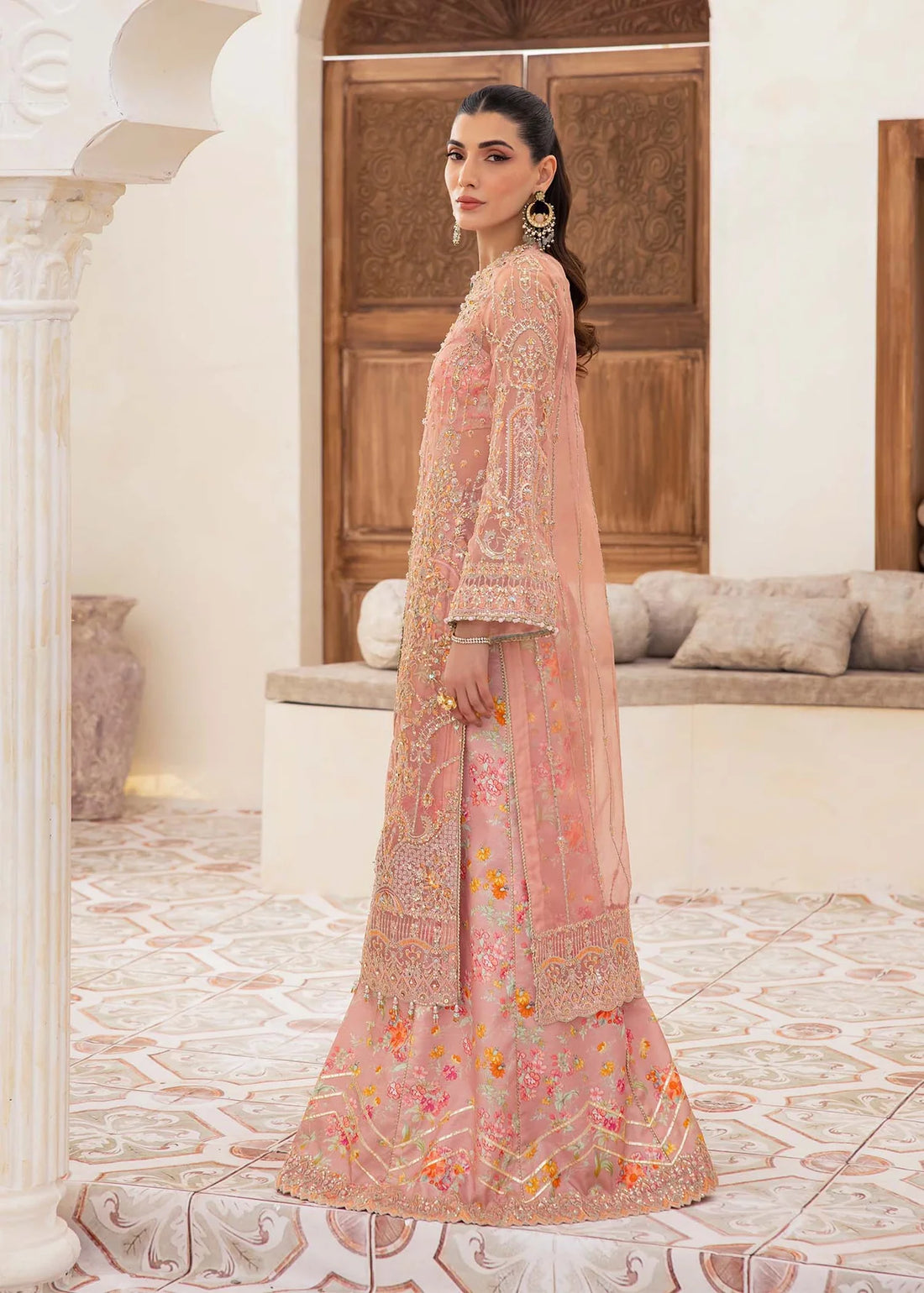 Peach organza Pakistani gown with sequin dupatta and printed flared trousers – ideal for formal wear and festive occasions in USA, UK, and Canada.