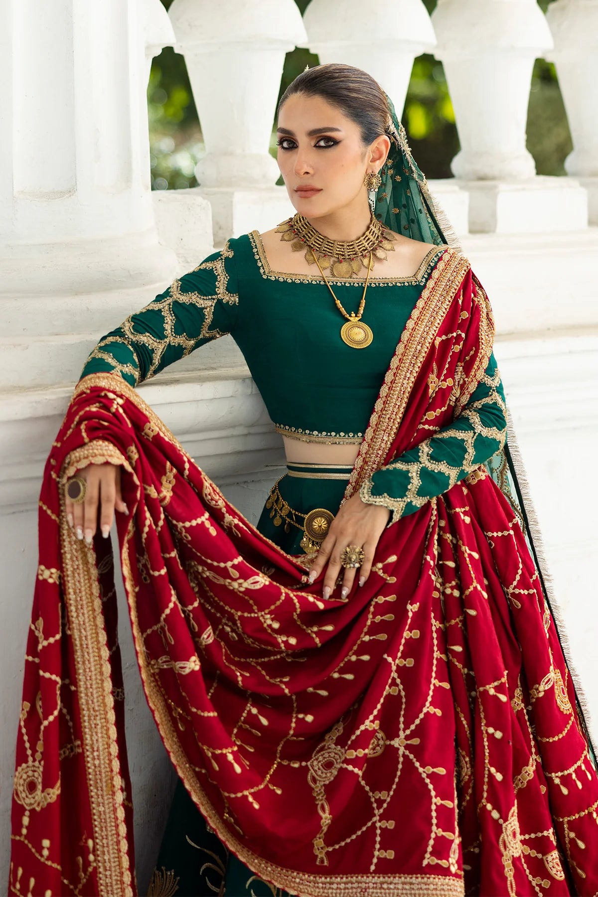 Evergreen stitched Pakistani bridal lehenga choli with embroidered dupatta & red shawl – Erum Khan Jahan Vol IV designer outfit.