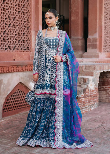 FEEHA – Teal bridal gharara suit with embroidered organza shirt, embellished bustier, silk gharara, and tie-dye dupatta. Online at Pakistanimoda.