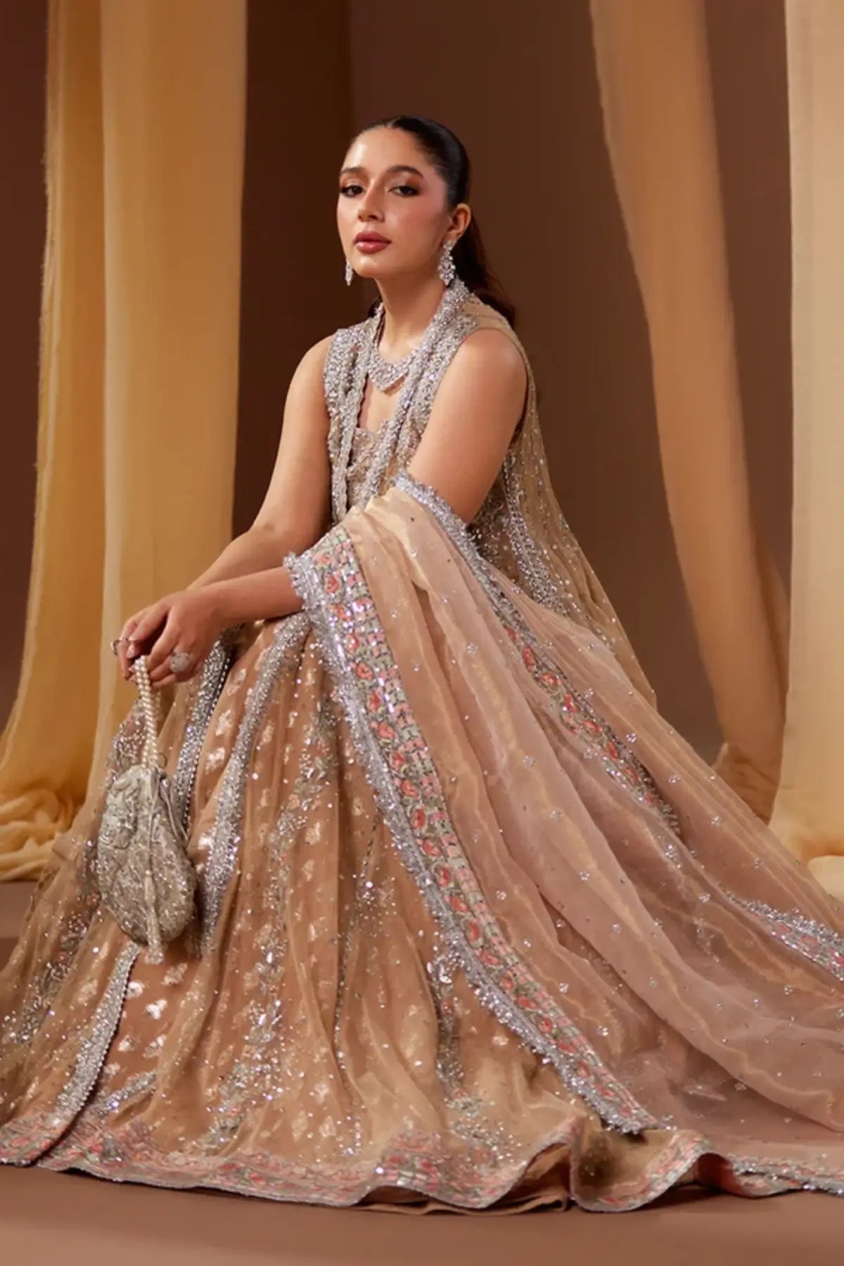Farheen Beige Embellished Net Wedding Pishwas with Silver Handwork, Cotton Jamawar Dhaka Pants, Lame Dupatta and Embellished Pouch