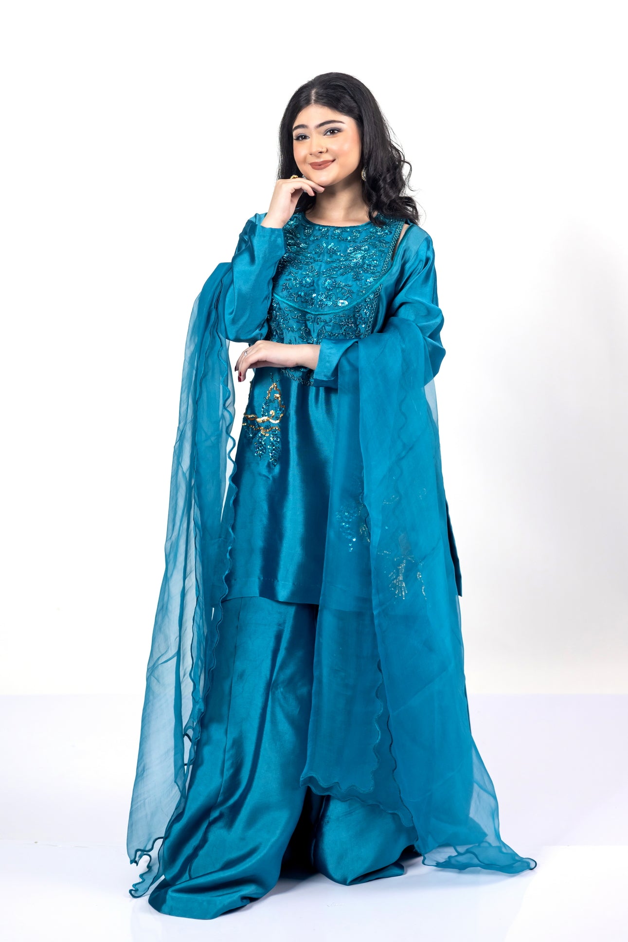 Faryal teal silk sharara set with sheesha silk shirt, flowing sharara, and organza dupatta with cutwork for evening events, dinner parties, and festive occasions by MariamRaj