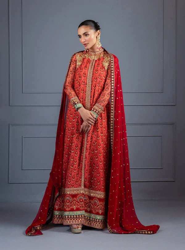Feride by Zainab Chottani fiery orange-red embroidered shirt with sequence chan, paired with raw silk trousers and chiffon dupatta, perfect for festive events.