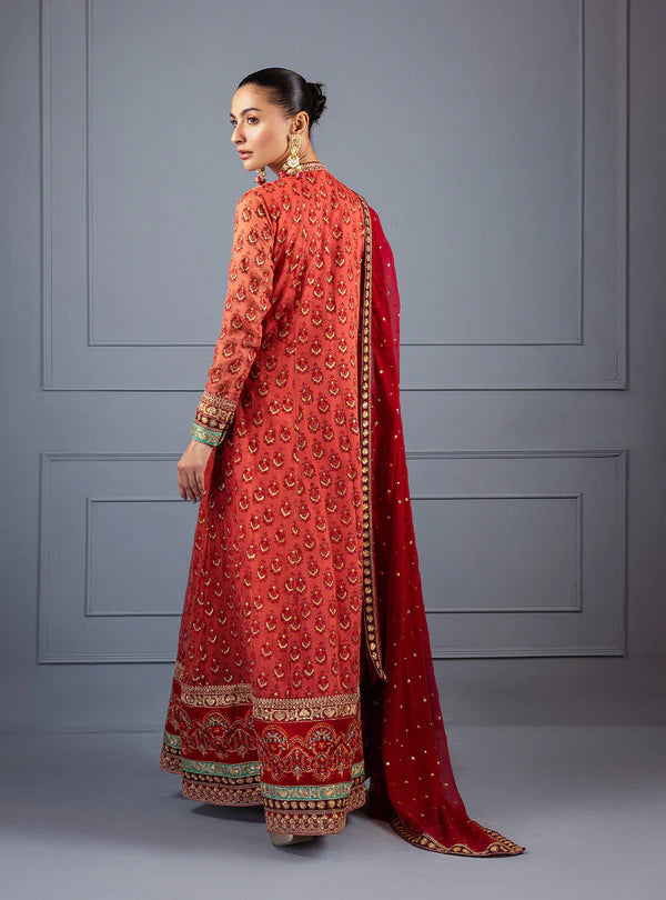 Feride by Zainab Chottani fiery orange-red embroidered shirt with sequence chan, paired with raw silk trousers and chiffon dupatta, perfect for festive events.