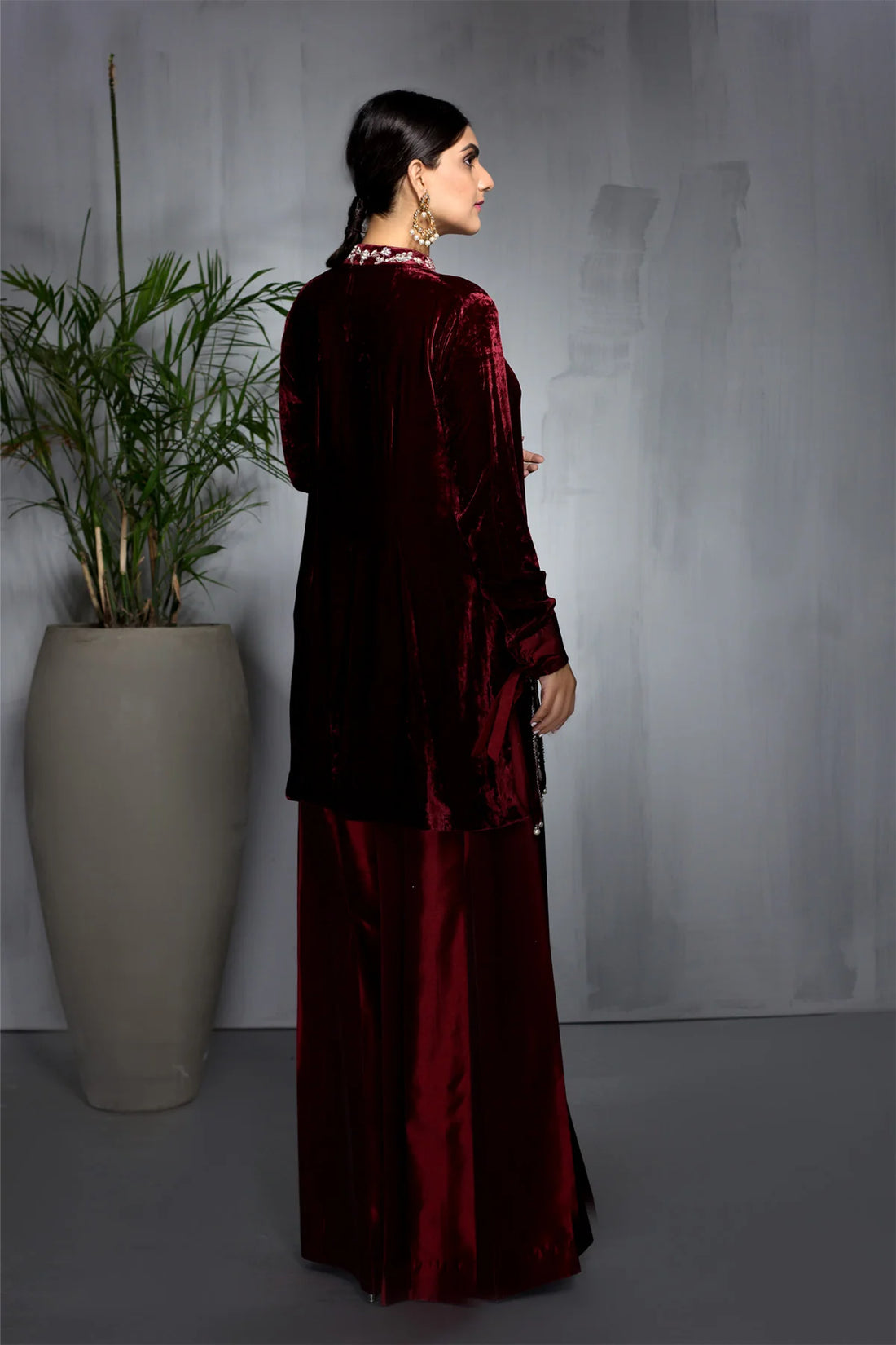 Maroon velvet short shirt with pearl and sequin embroidery, paired with flared taffeta pants – Pakistani formal wear for women at Pakistanimoda