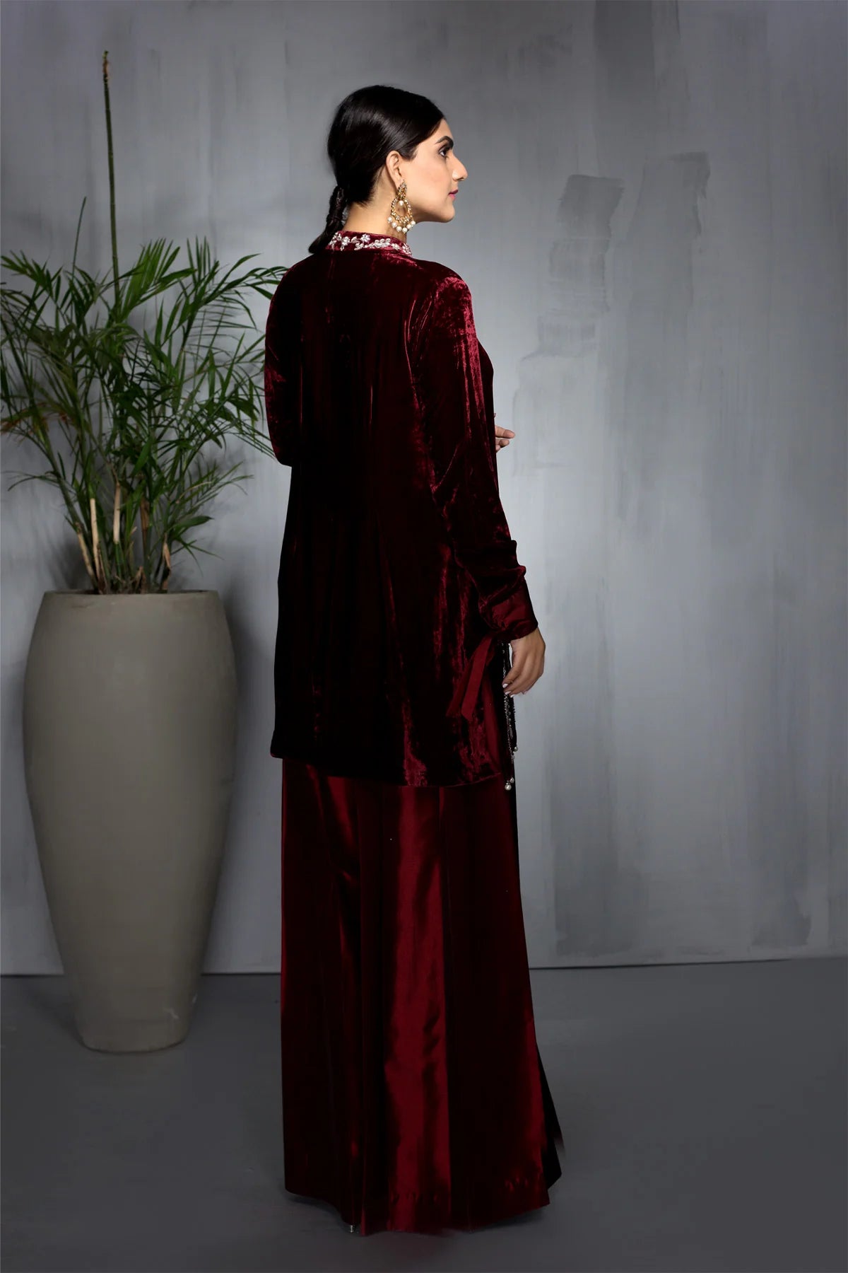 Maroon velvet short shirt with pearl and sequin embroidery, paired with flared taffeta pants – Pakistani formal wear for women at Pakistanimoda