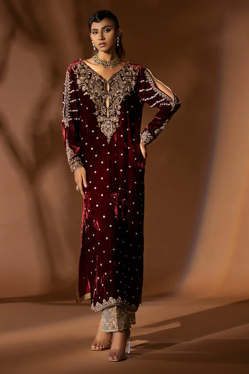 Maroon velvet shirt with heavy dabka and zardozi handwork, bootcut jamawar pants with organza hem, and matching organza dupatta – wedding outfit 2025.
