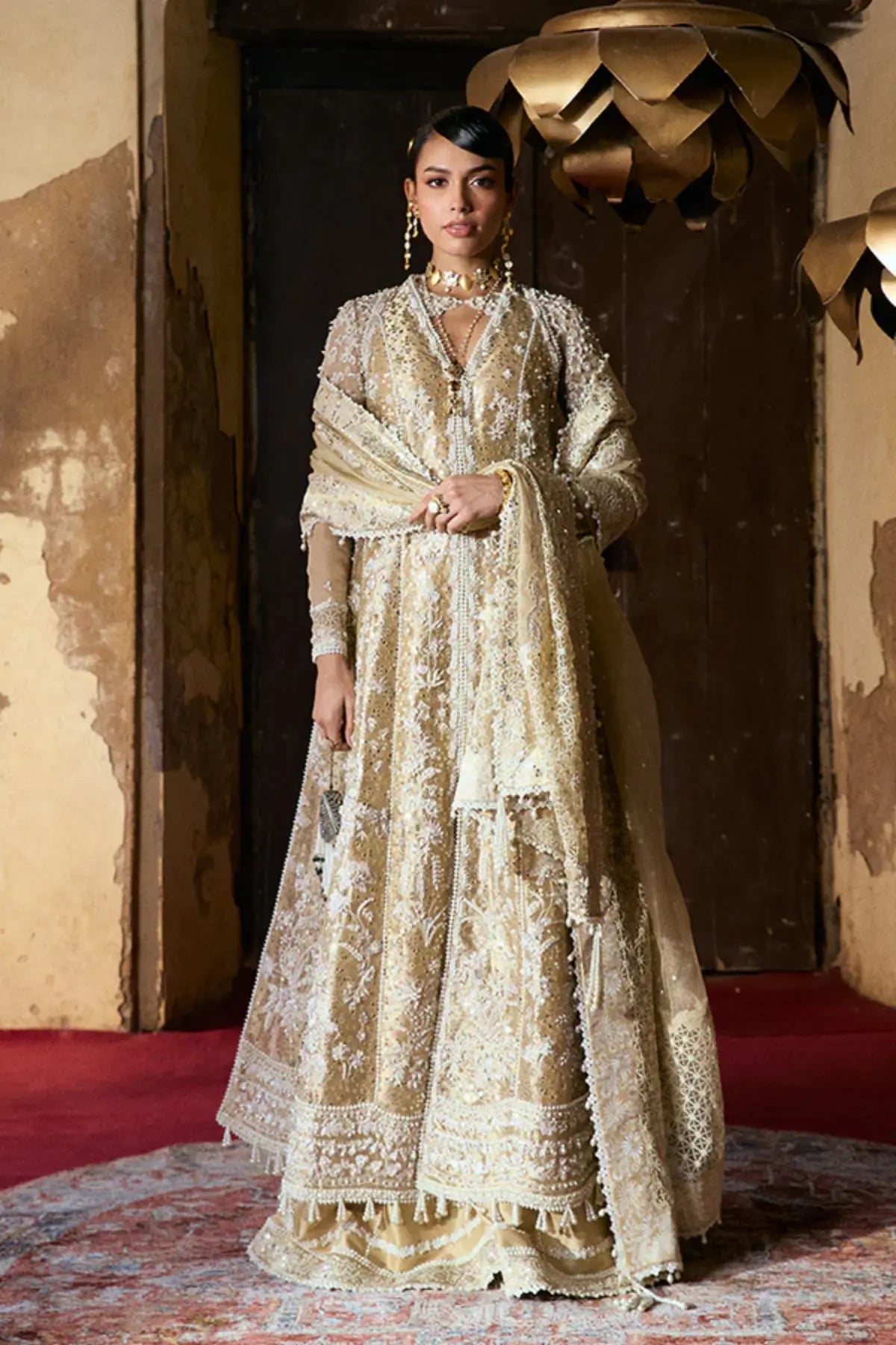 GULRAIZ by Suffuse gold stitched tissue silk formal outfit with zari net dupatta and heavy embellishment for weddings