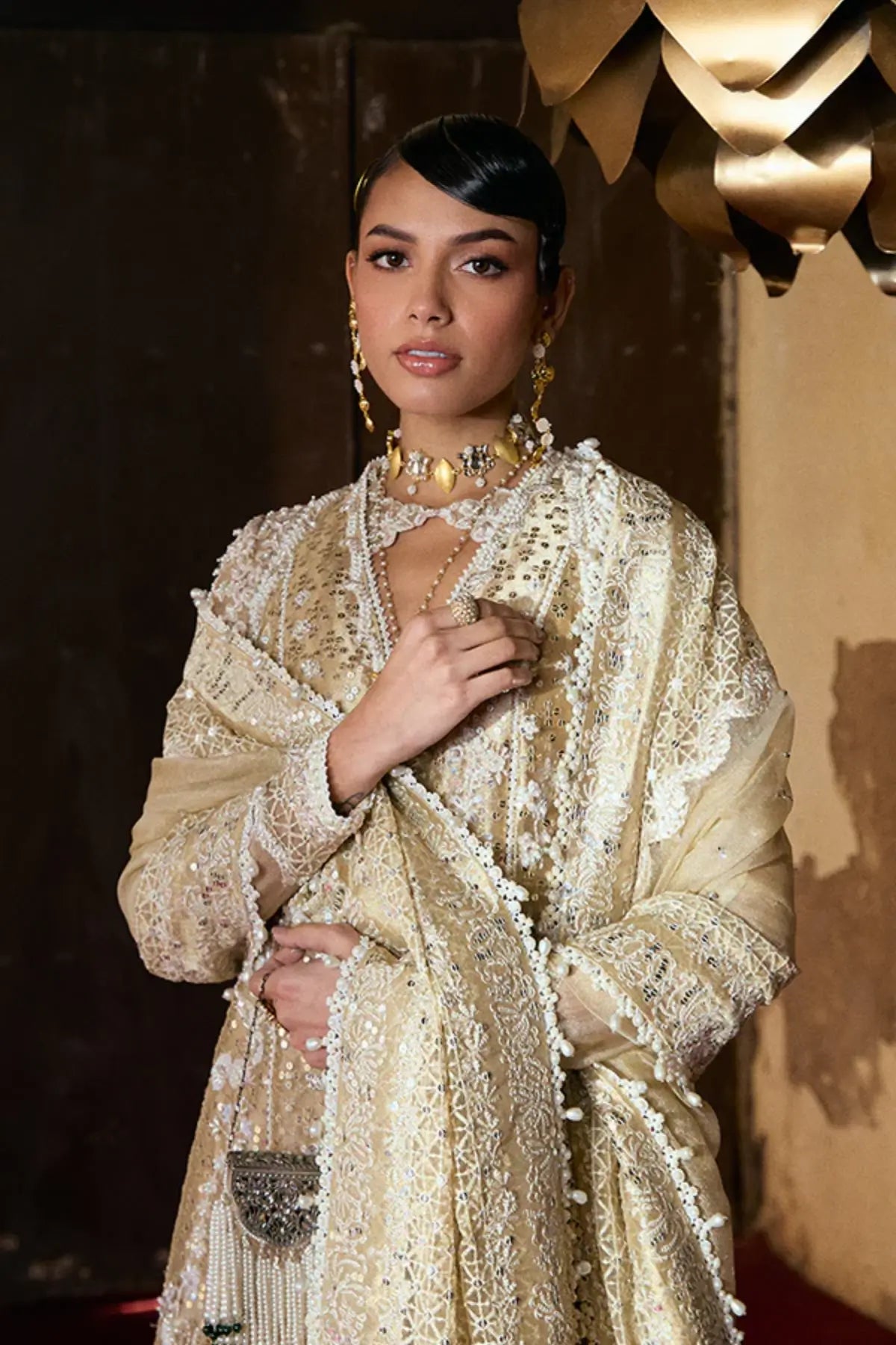 GULRAIZ by Suffuse gold stitched tissue silk formal outfit with zari net dupatta and heavy embellishment for weddings