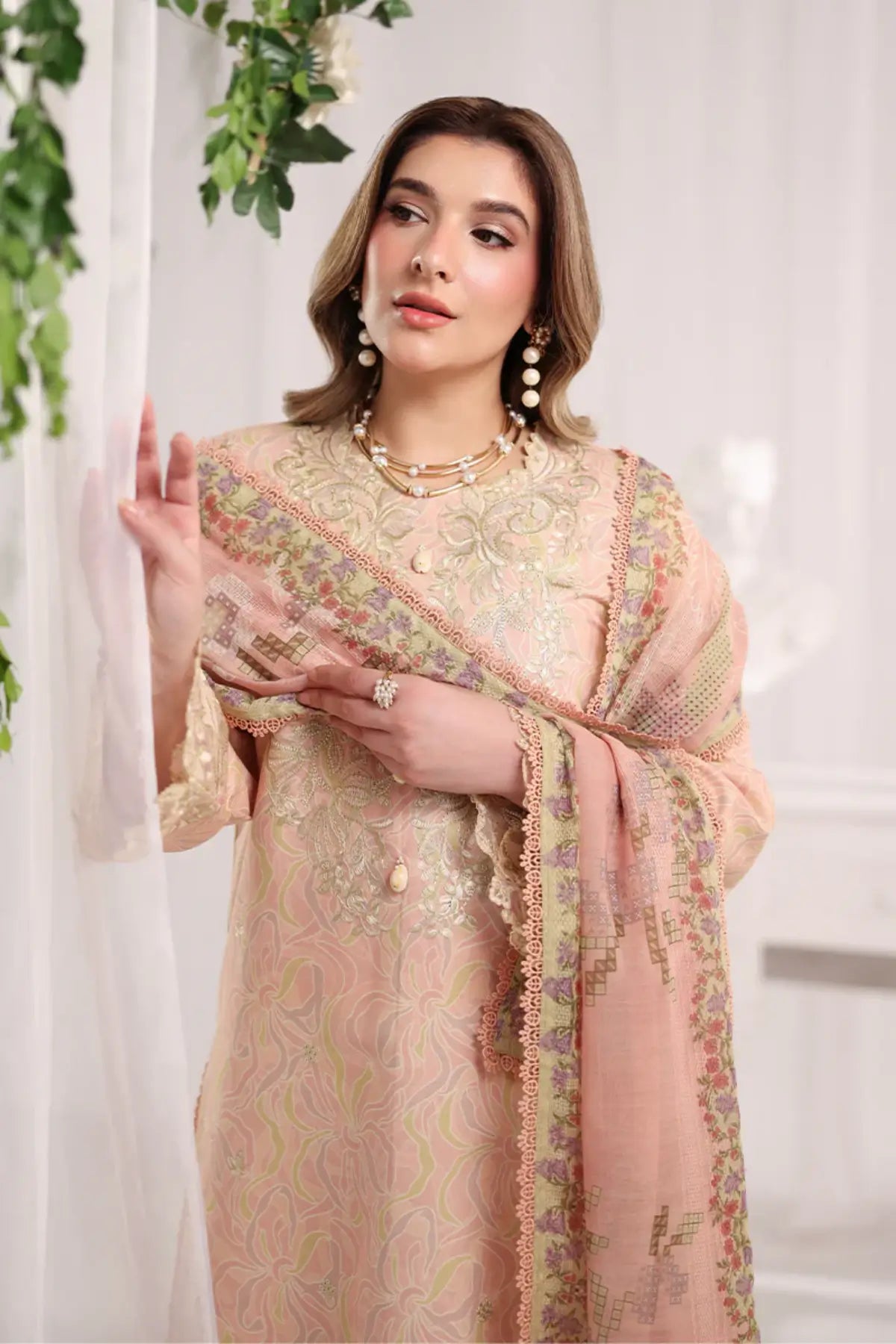 Gabriella Rang Rasiya Champagne designer lawn stitched suit with embroidered front, organza borders, textured dupatta and cotton trousers