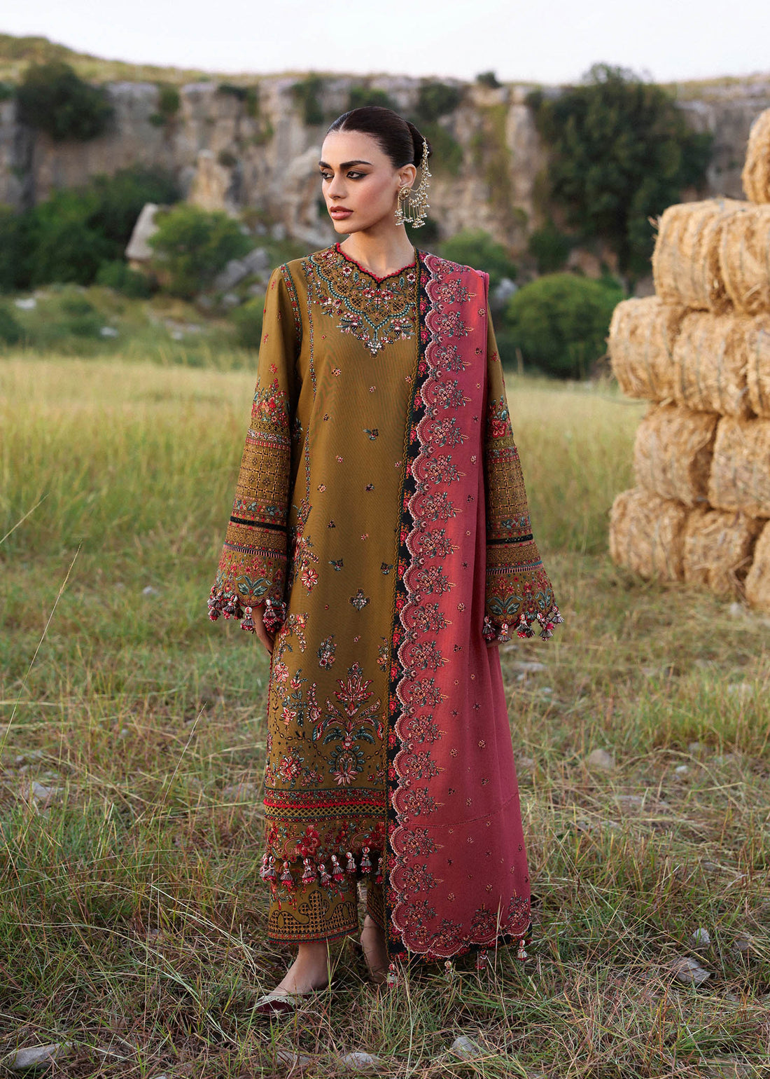 Hussain Rehar Gitiara olive green embroidered khaddar stitched suit with carrot red wool shawl at Pakistanimoda.