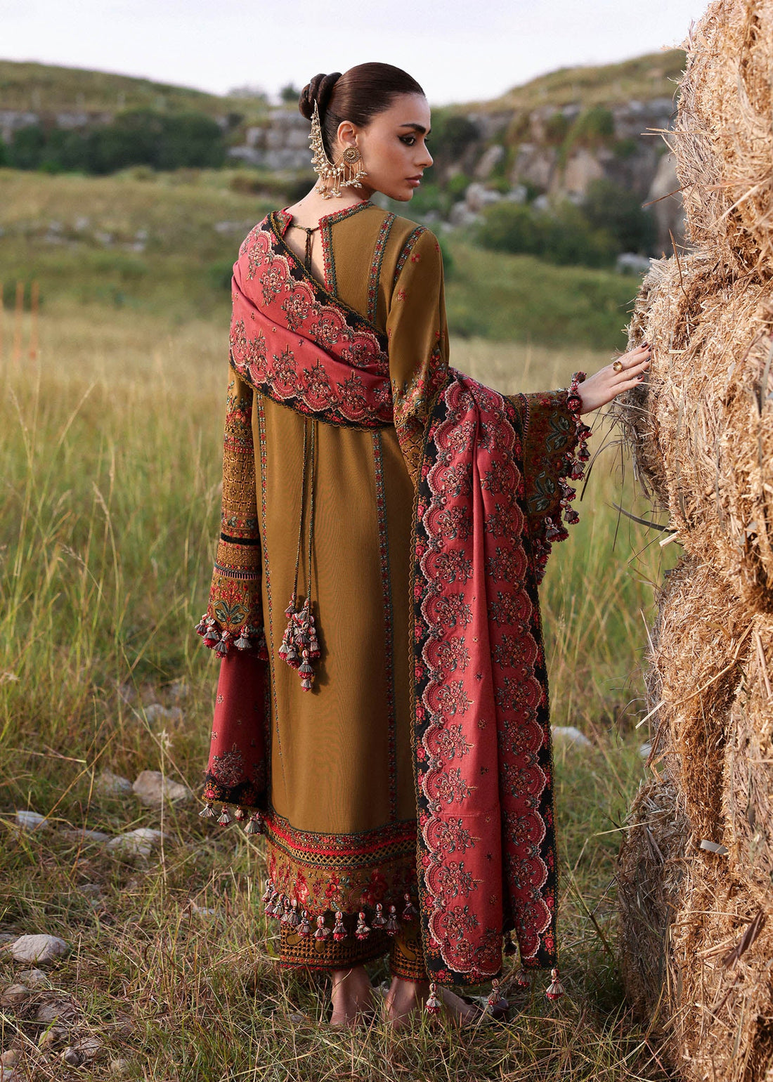 Hussain Rehar Gitiara olive green embroidered khaddar stitched suit with carrot red wool shawl at Pakistanimoda.