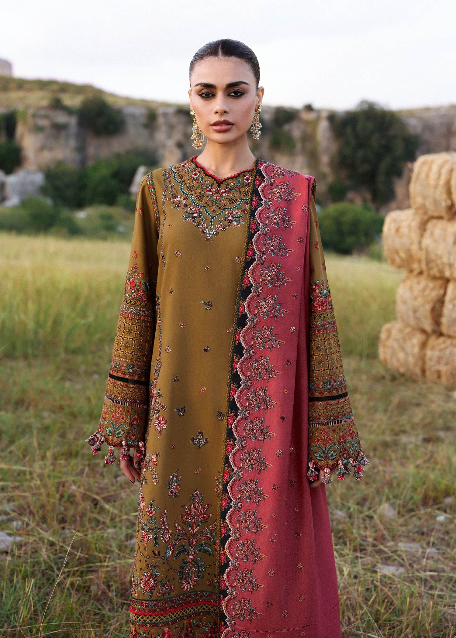 Hussain Rehar Gitiara olive green embroidered khaddar stitched suit with carrot red wool shawl at Pakistanimoda.