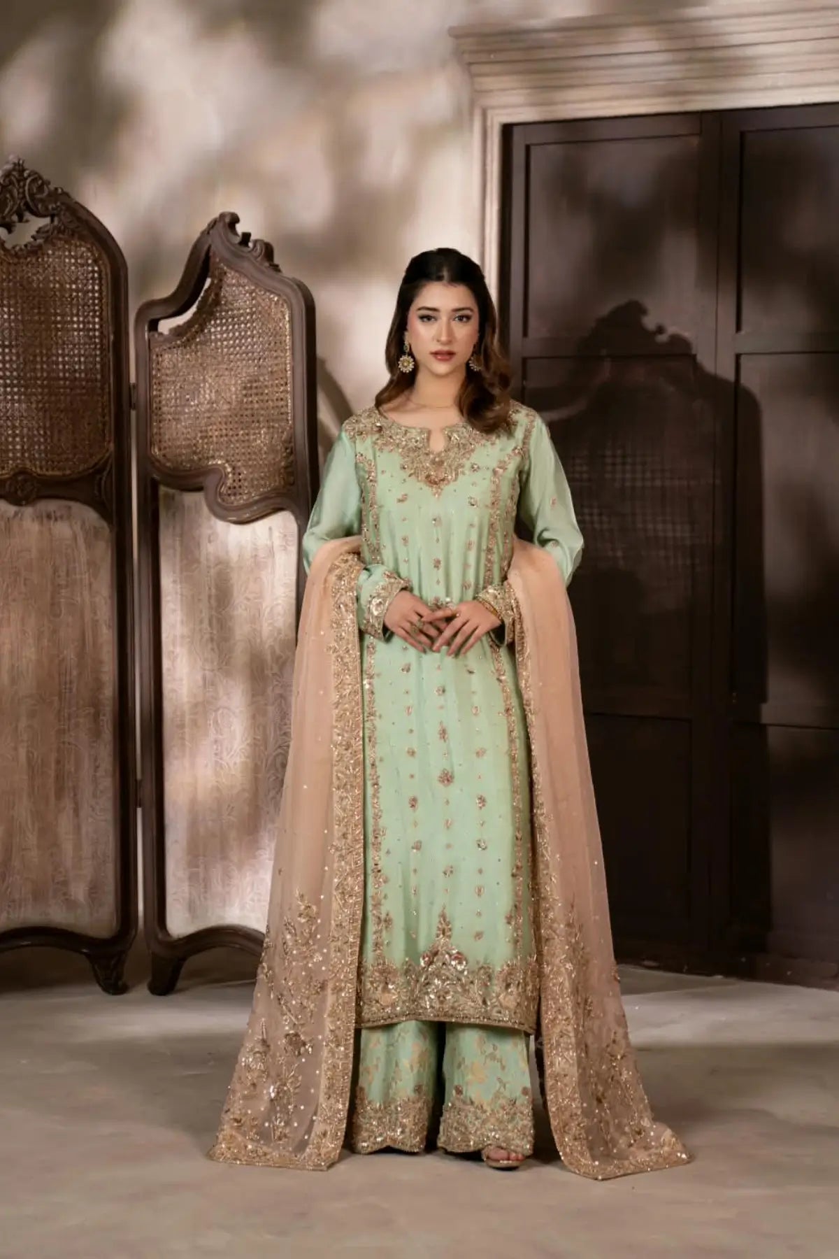 Gulbahar mint green handworked Sheesha silk formal suit with peach organza dupatta by MariamRaj