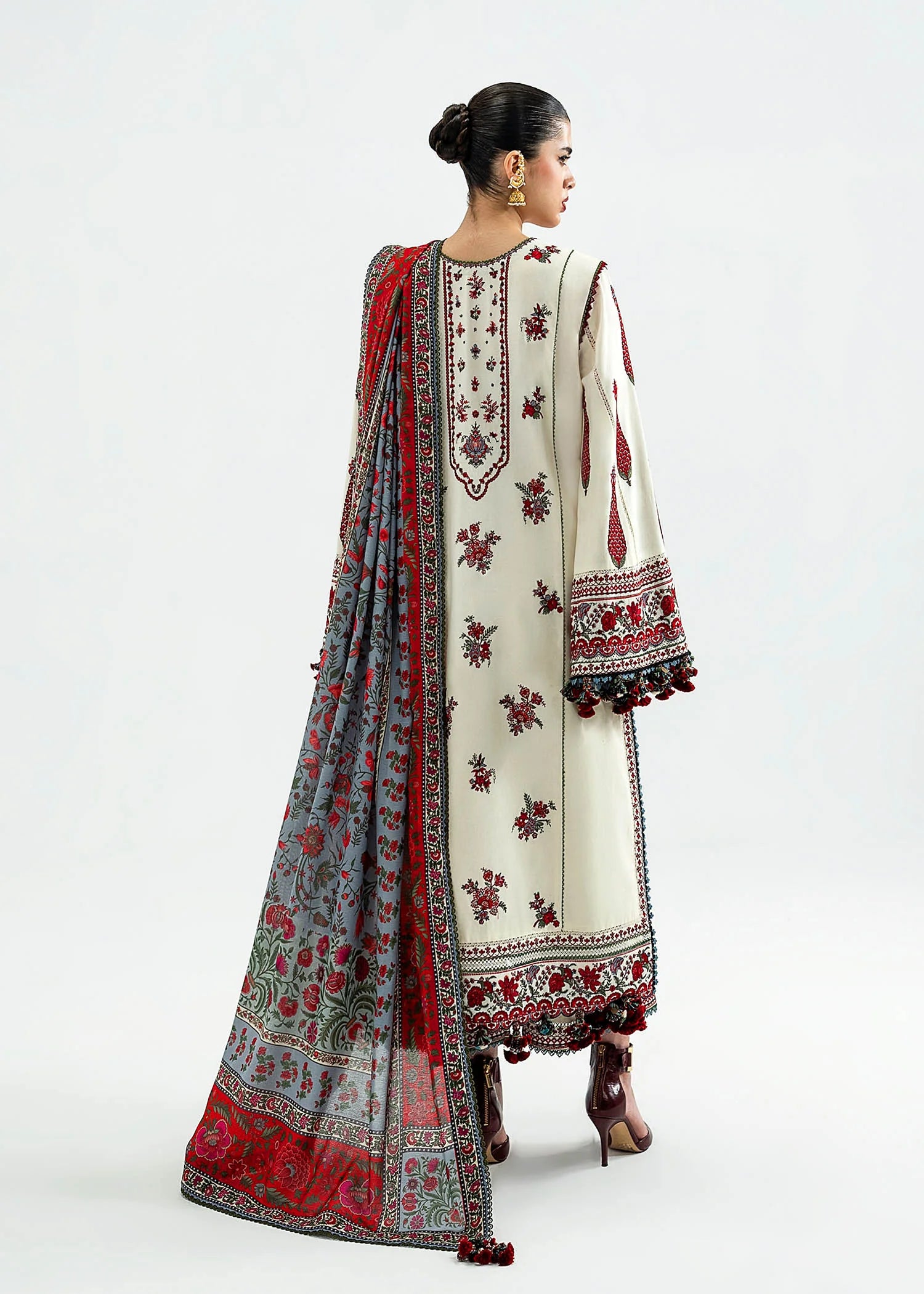 Gulban Hussain Rehar ivory embroidered khaddar stitched suit with printed wool shawl at Pakistanimoda.