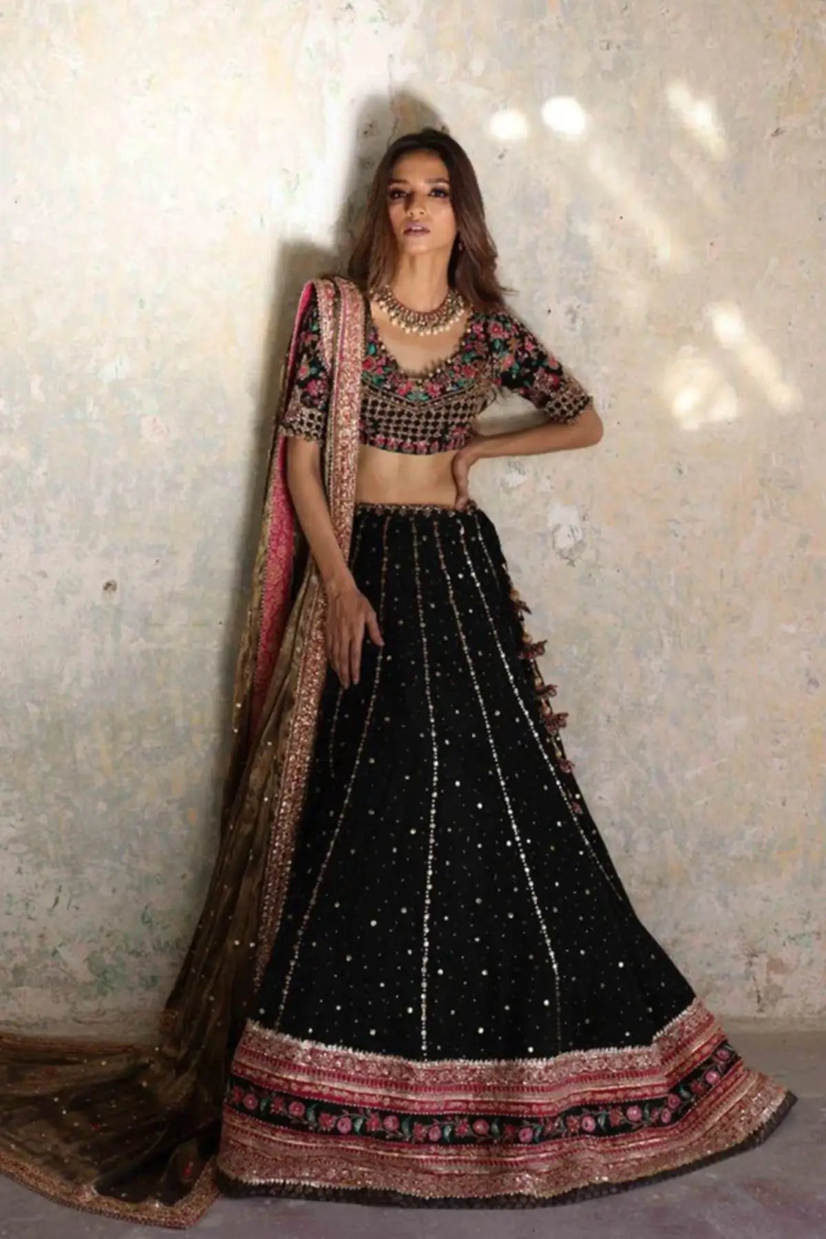 Gulnaaz Black Gold Embroidered Cotton Net Pakistani Formal Lehenga Choli with Pink Firozi Floral Details and Lame Dupatta