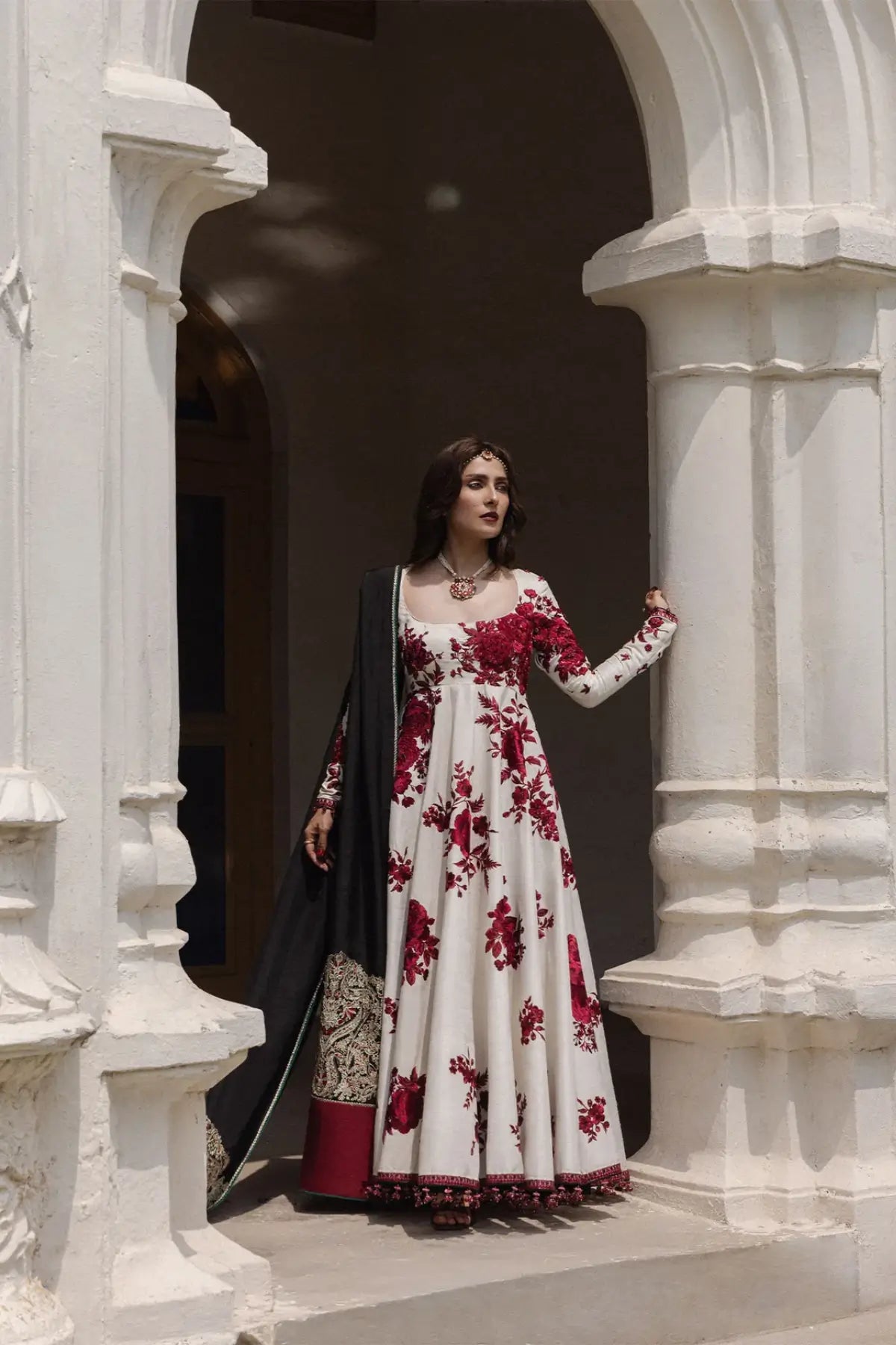 Gulnar Hussain Rehar ivory embroidered stitched Peshwas with crimson floral embroidery and black raw silk shawl
