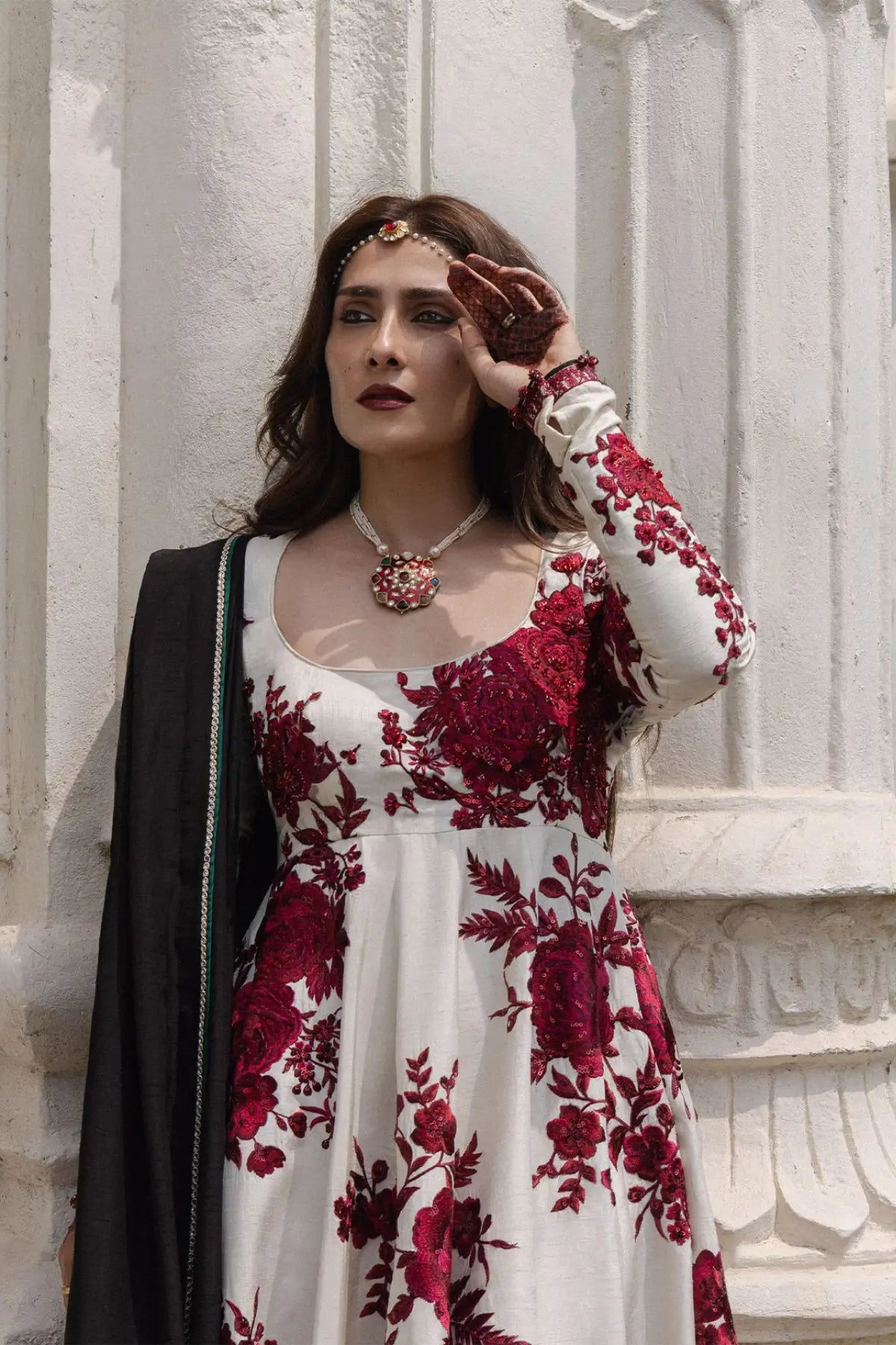 Gulnar Hussain Rehar ivory embroidered stitched Peshwas with crimson floral embroidery and black raw silk shawl