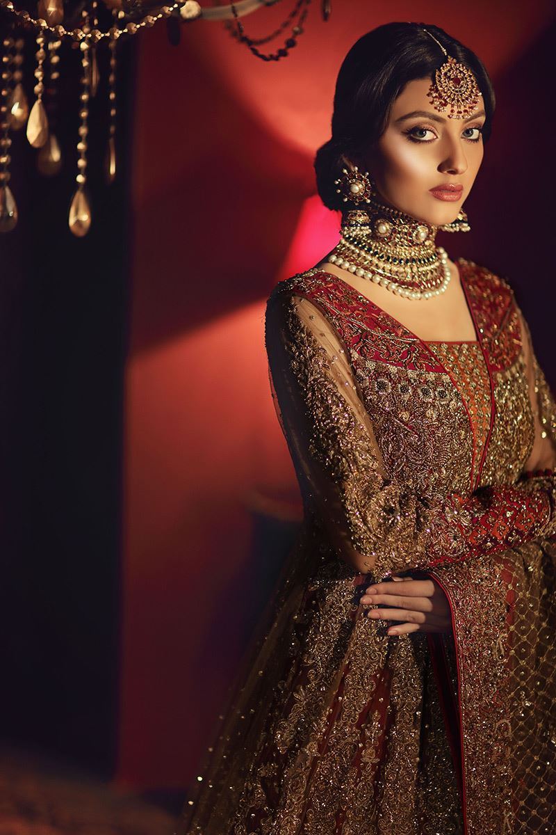 Gulrukh Begum-Contemporary Golden Pakistani Bridal Ensemble with Red Lehenga