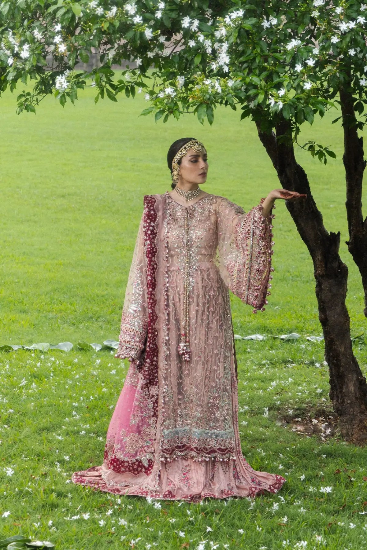 Gulrukh Hussain Rehar powder pink embroidered net stitched sharara suit with maroon pink organza dupatta