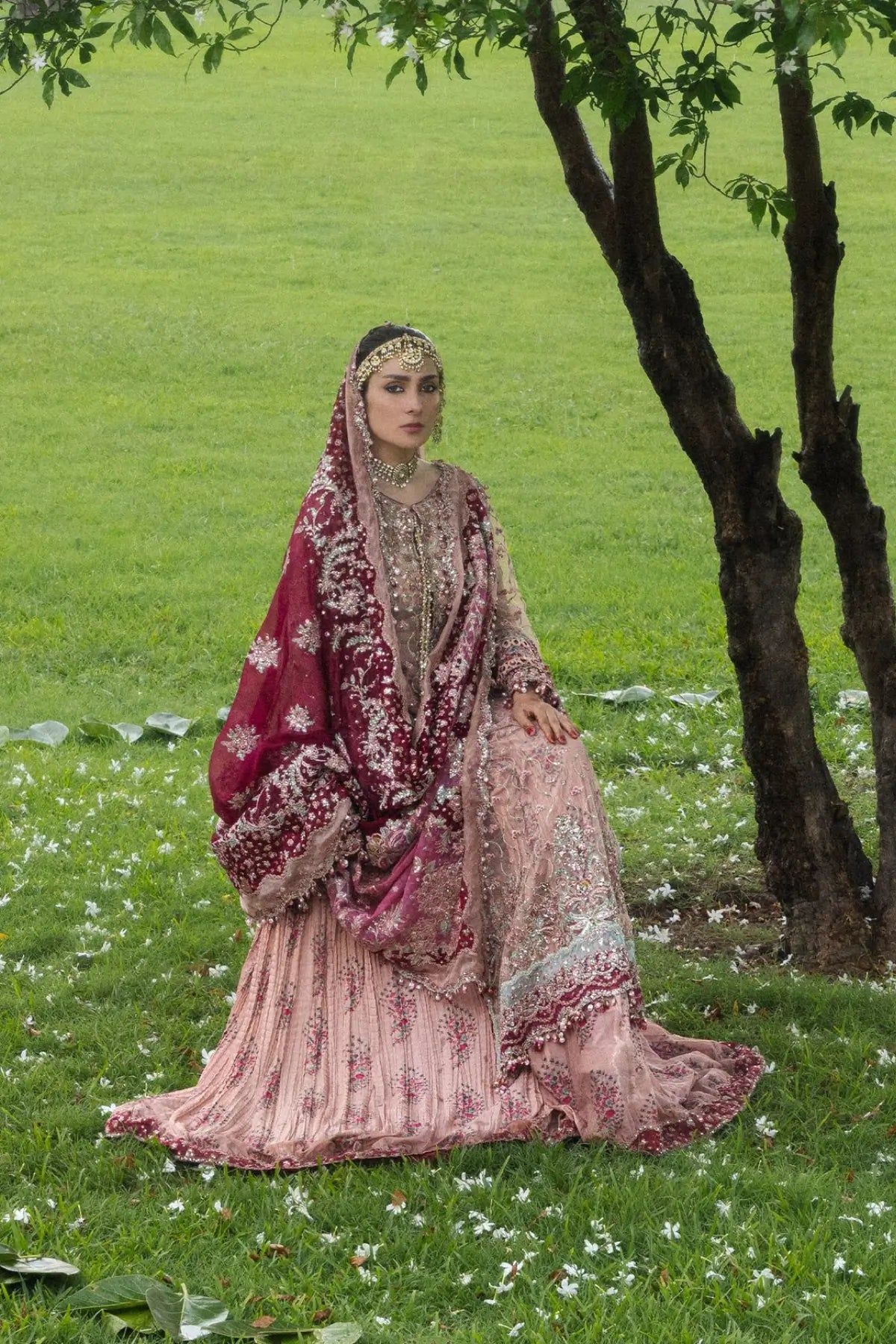 Gulrukh Hussain Rehar powder pink embroidered net stitched sharara suit with maroon pink organza dupatta