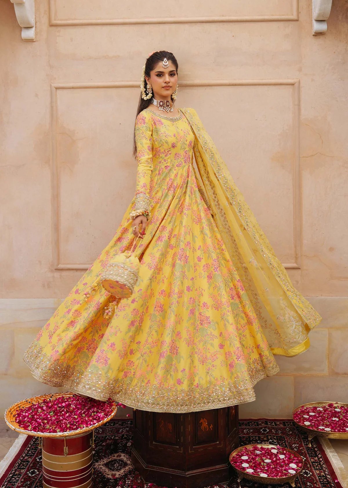 Hoorain bright yellow screen-printed pishwas with embroidered neckline, churidaar pajama, and dupatta by Kanwal Malik from the Saheli Luxury Pret Collection.