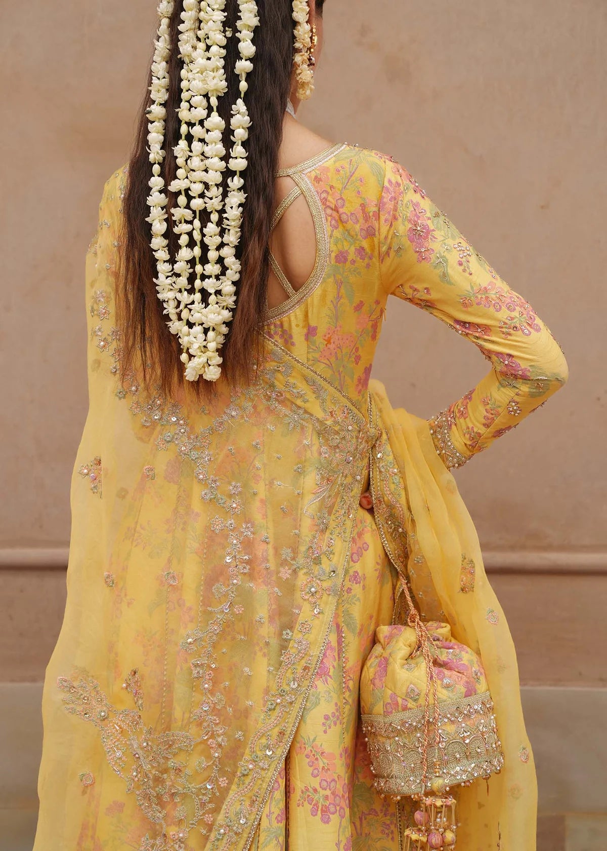 Hoorain bright yellow screen-printed pishwas with embroidered neckline, churidaar pajama, and dupatta by Kanwal Malik from the Saheli Luxury Pret Collection.