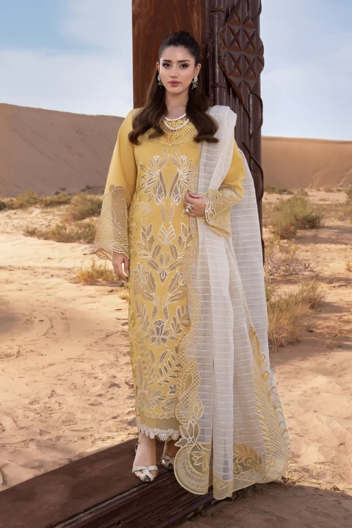 Rang Rasiya Hoorain yellow lawn outfit featuring schiffli and cutwork accents