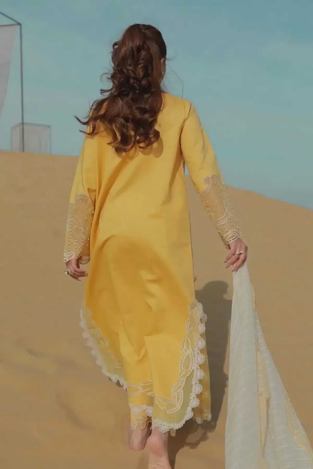 Rang Rasiya Hoorain yellow lawn outfit featuring schiffli and cutwork accents