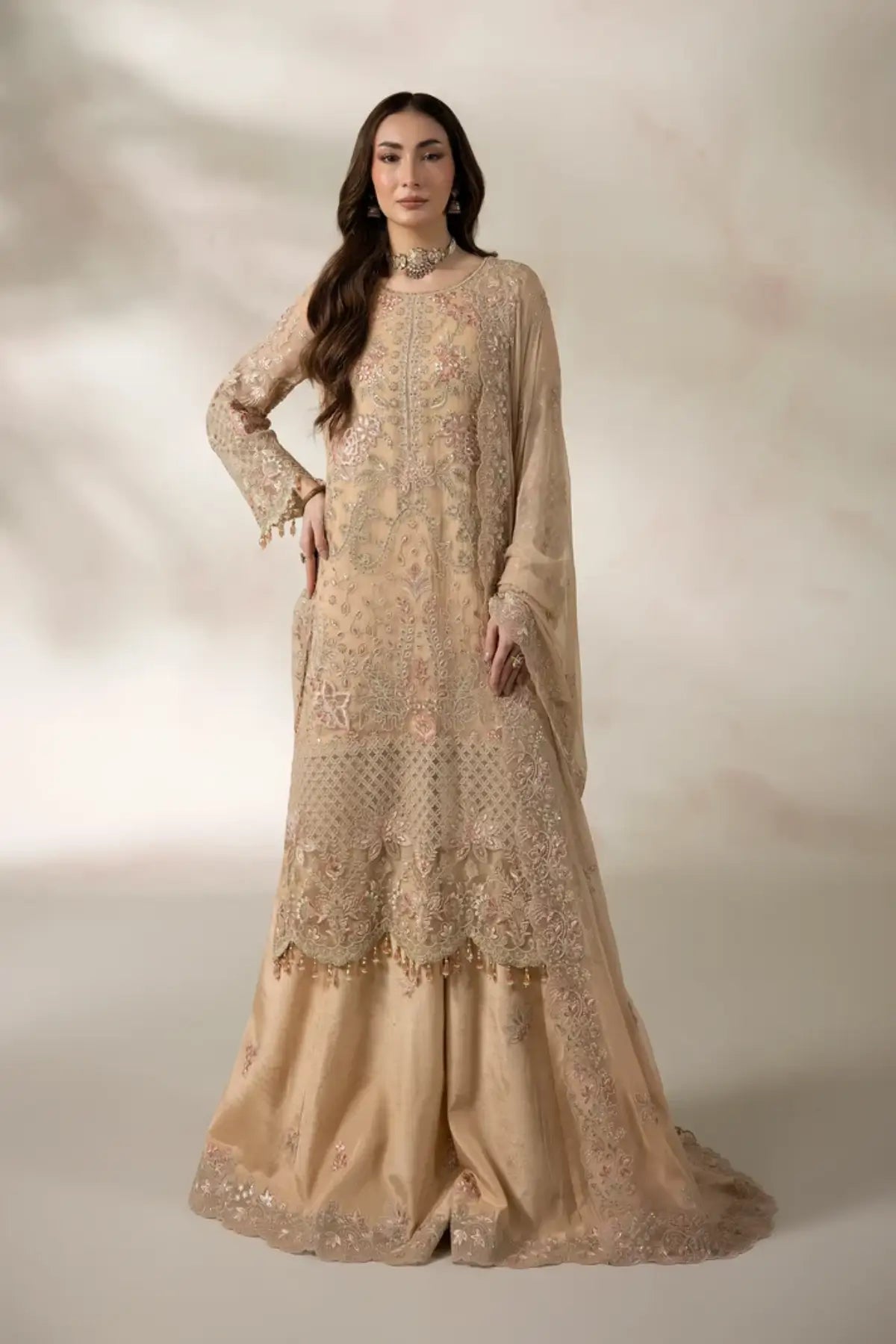 I-285 Chantilly by Imrozia, skin peach embroidered chiffon stitched suit with raw silk trouser and chiffon dupatta.