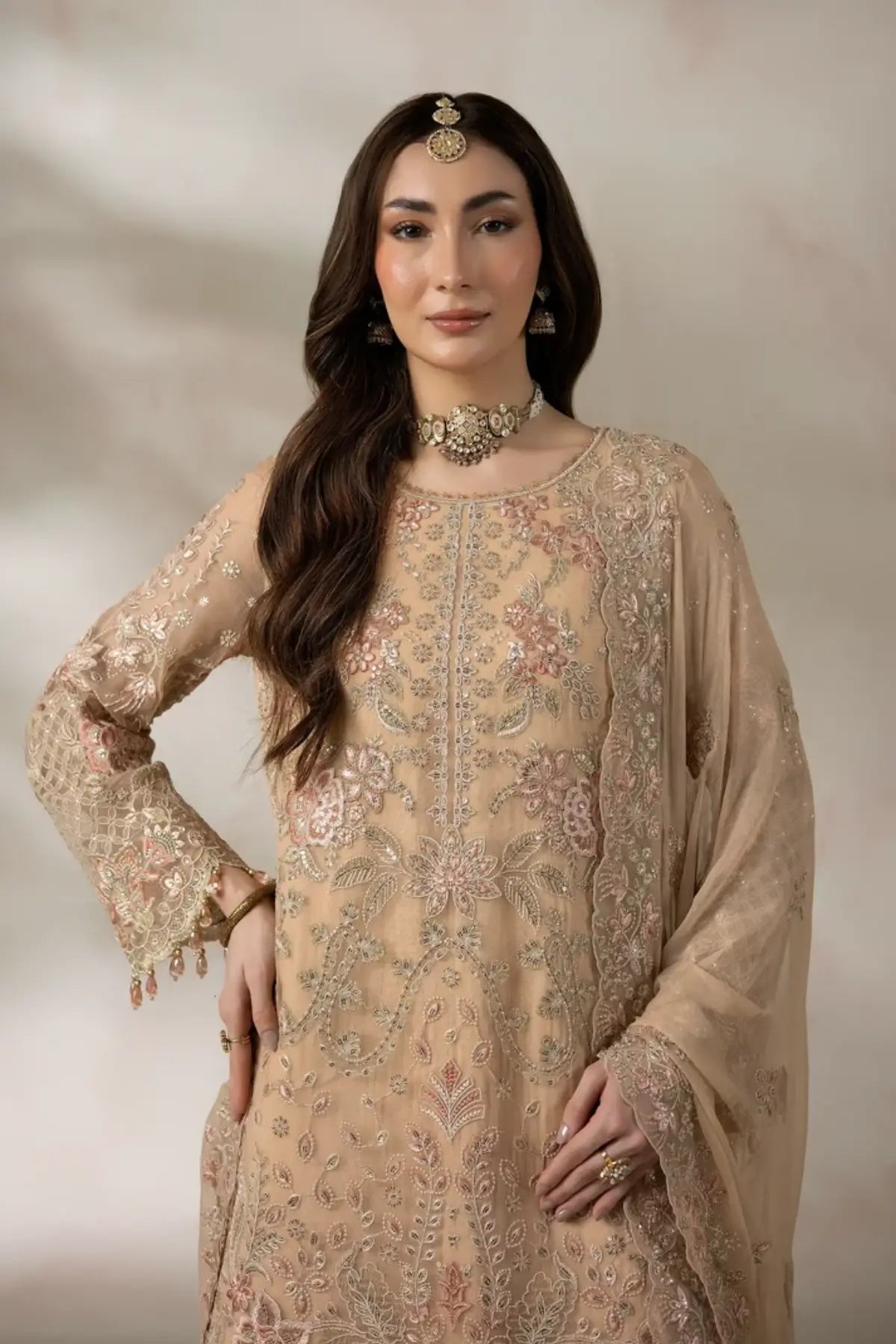 I-285 Chantilly by Imrozia, skin peach embroidered chiffon stitched suit with raw silk trouser and chiffon dupatta.