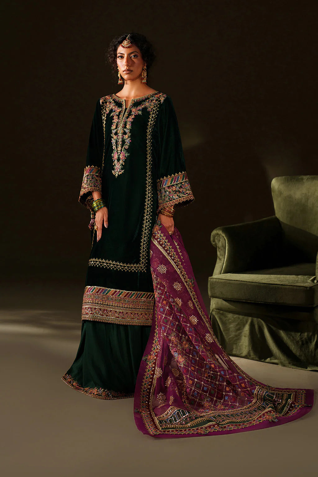 Iznik Velvet Edit II IV-74 bottle green embroidered velvet suit with organza dupatta and raw silk trouser, stitched festive outfit at Pakistanimoda.