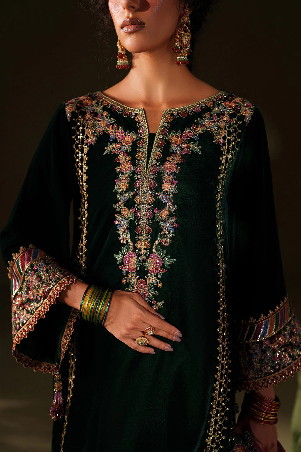 Iznik Velvet Edit II IV-74 bottle green embroidered velvet suit with organza dupatta and raw silk trouser, stitched festive outfit at Pakistanimoda.