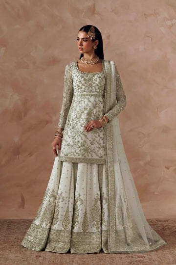 Ismara white embroidered net formal stitched lehenga dress with matching net dupatta from Riwayat Bridal Edit 26