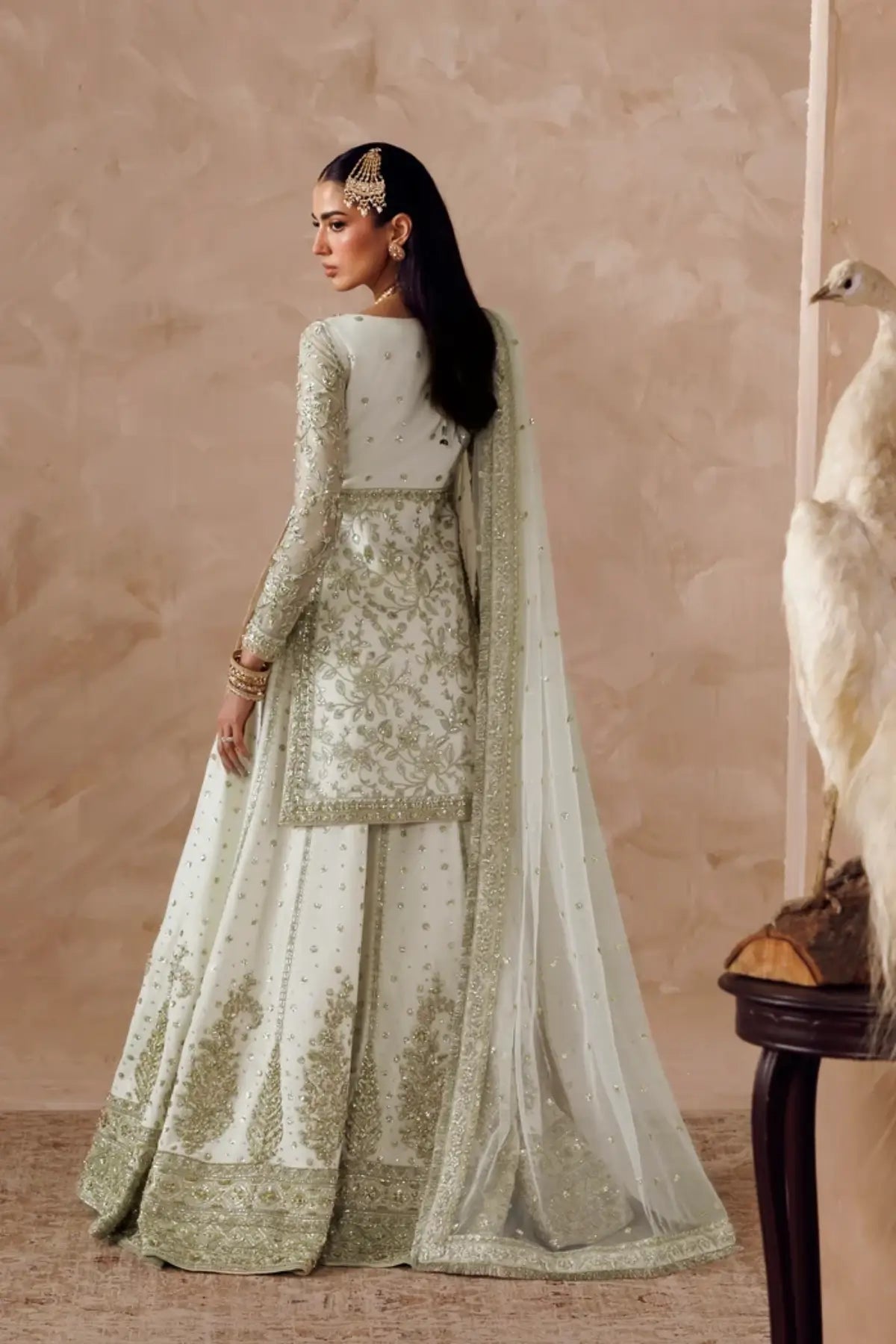 Ismara white embroidered net formal stitched lehenga dress with matching net dupatta from Riwayat Bridal Edit 26