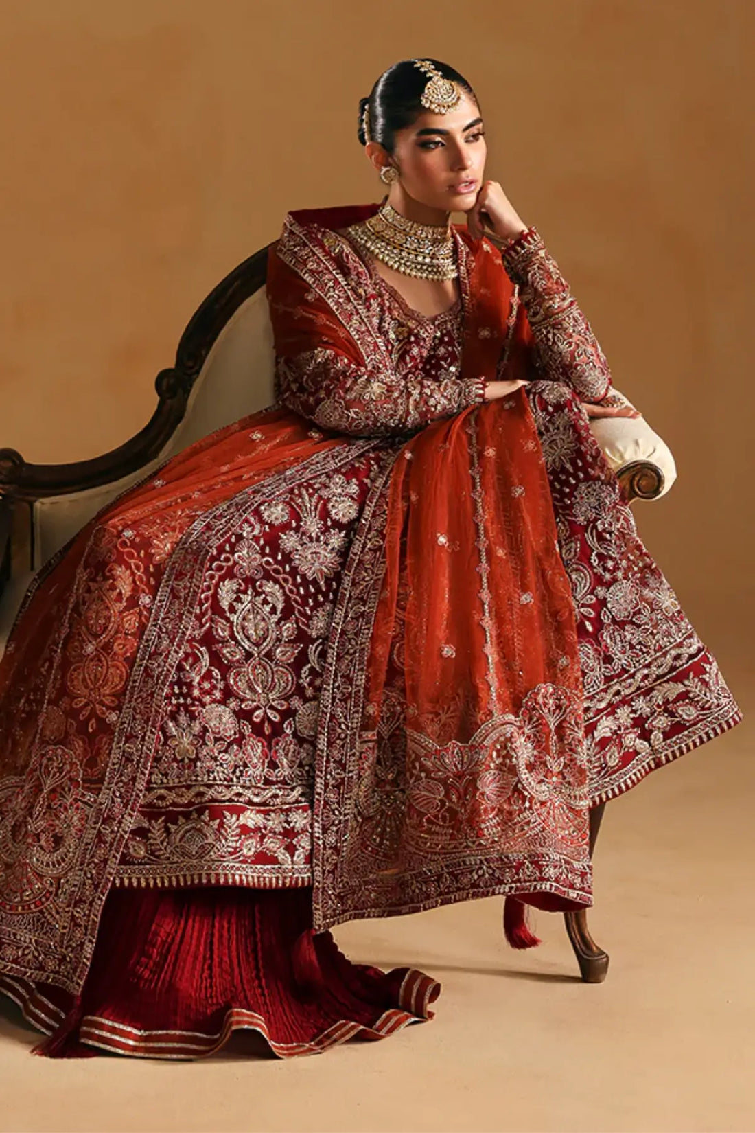 Jahari by Gulaal crimson red net pishwas with raw silk lehenga stitched and available online at Pakistanimoda.