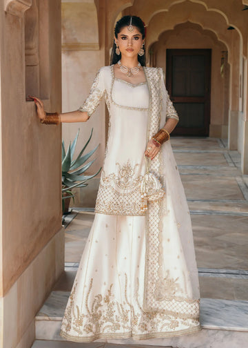 Jaya ivory embroidered Korean silk outfit with silk pants and embroidered organza dupatta by Kanwal Malik from the Saheli Luxury Pret Collection.
