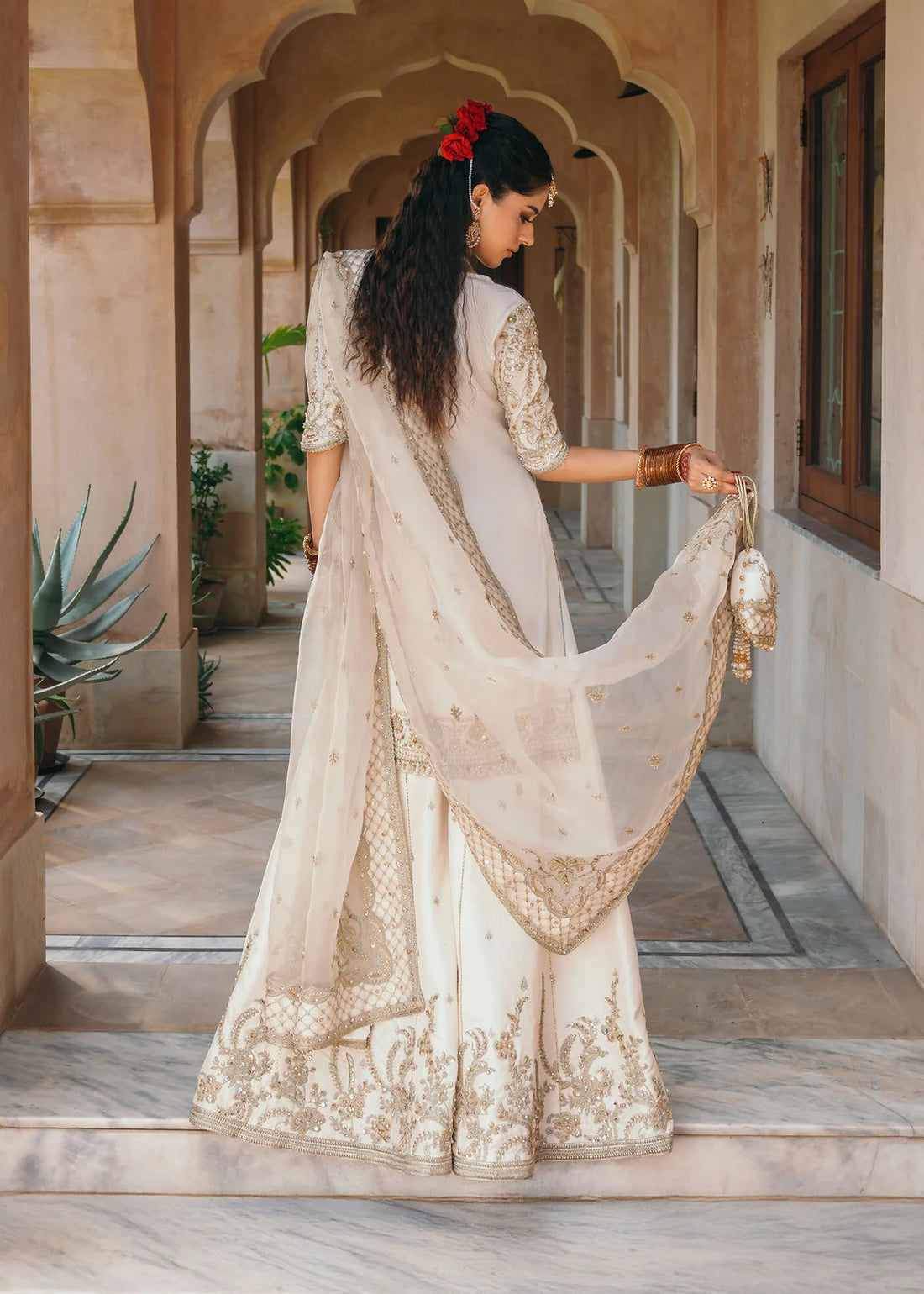Jaya ivory embroidered Korean silk outfit with silk pants and embroidered organza dupatta by Kanwal Malik from the Saheli Luxury Pret Collection.
