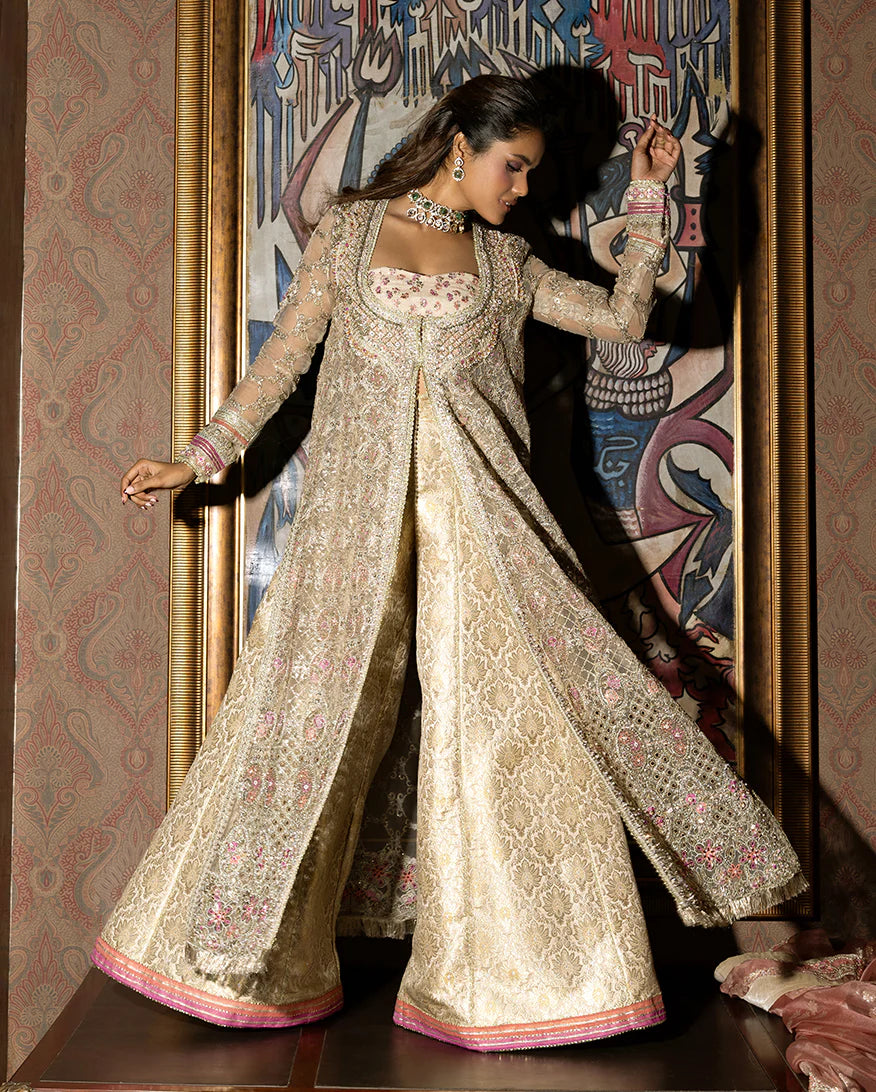 Jhilmil gold stitched front open organza gown with wide jamawar pants from Mushq Darlings Wedding Collection available at Pakistanimoda.
